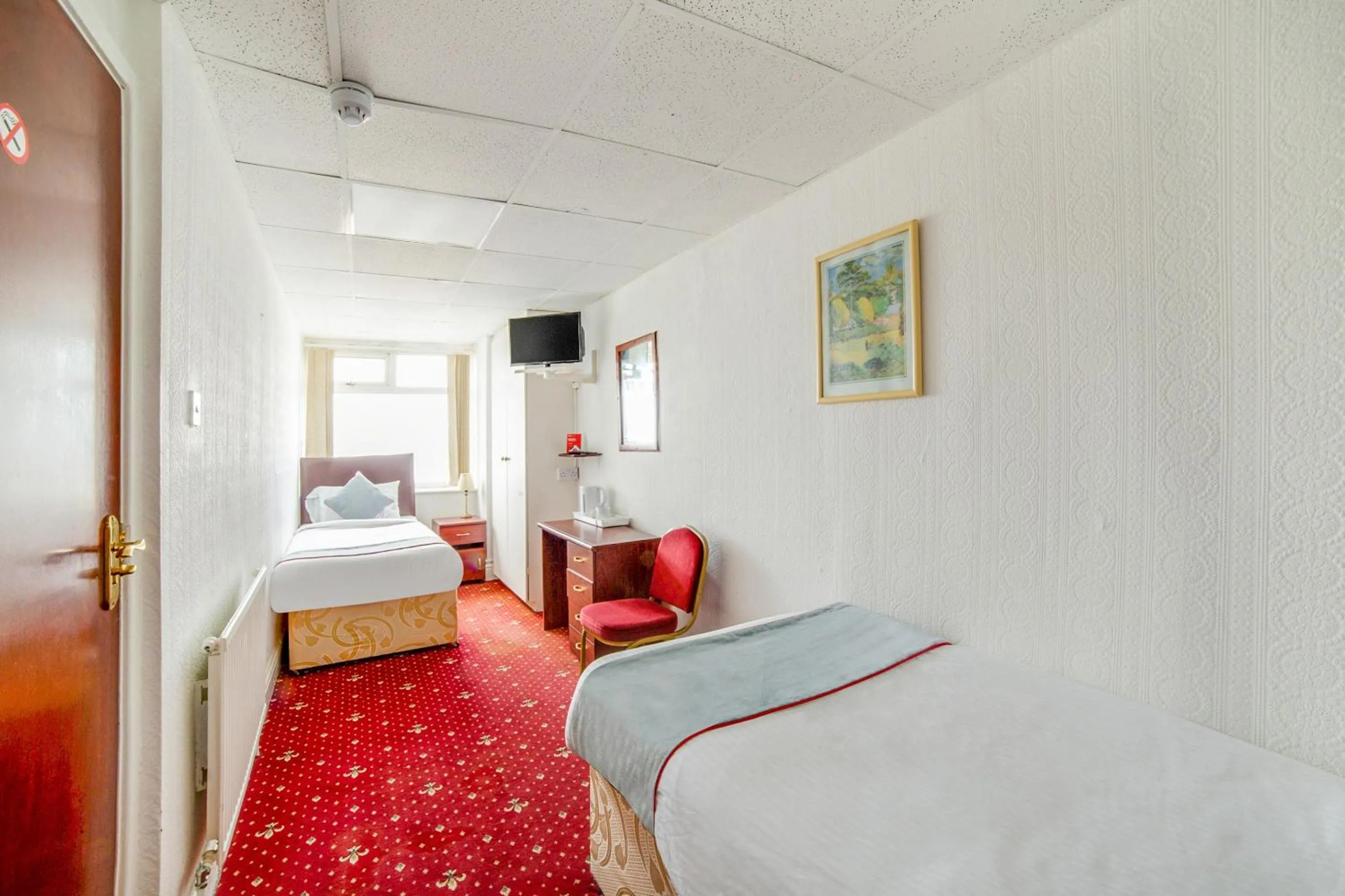 Bedroom in OYO The Golden Cheval Hotel