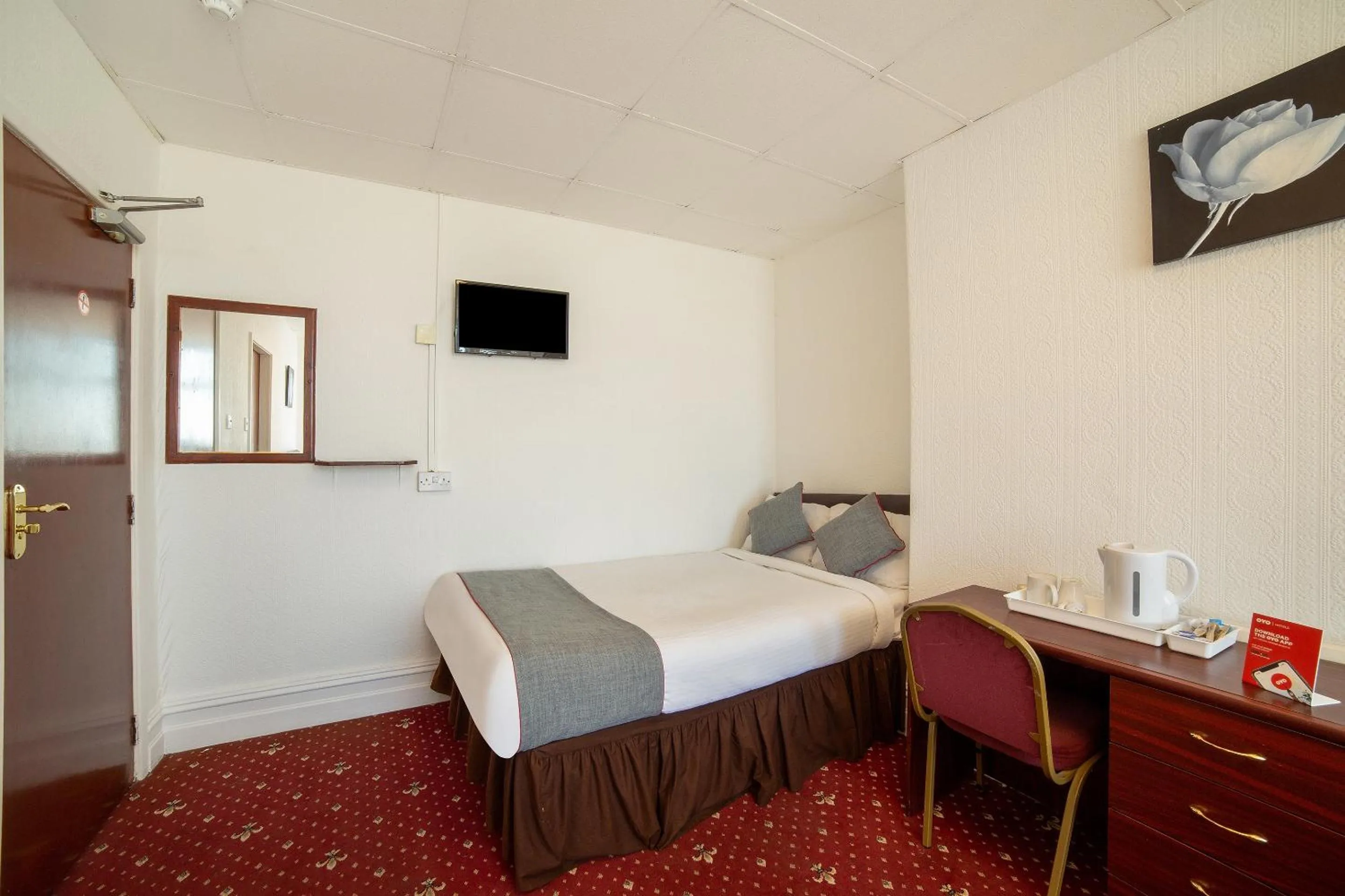 Bedroom in OYO The Golden Cheval Hotel