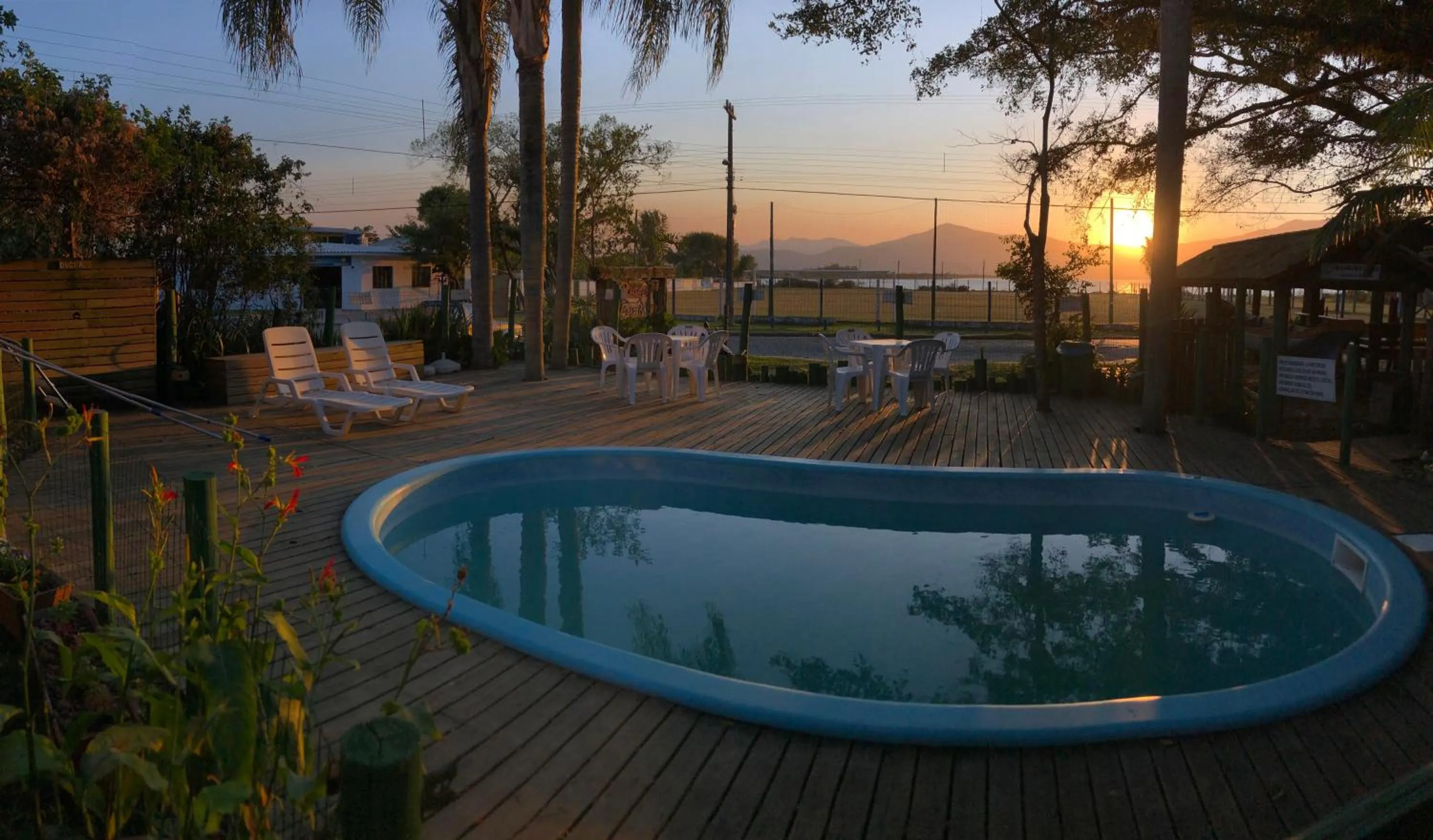 Swimming pool in Pousada Canoa Azul na Praia da Ferrugem