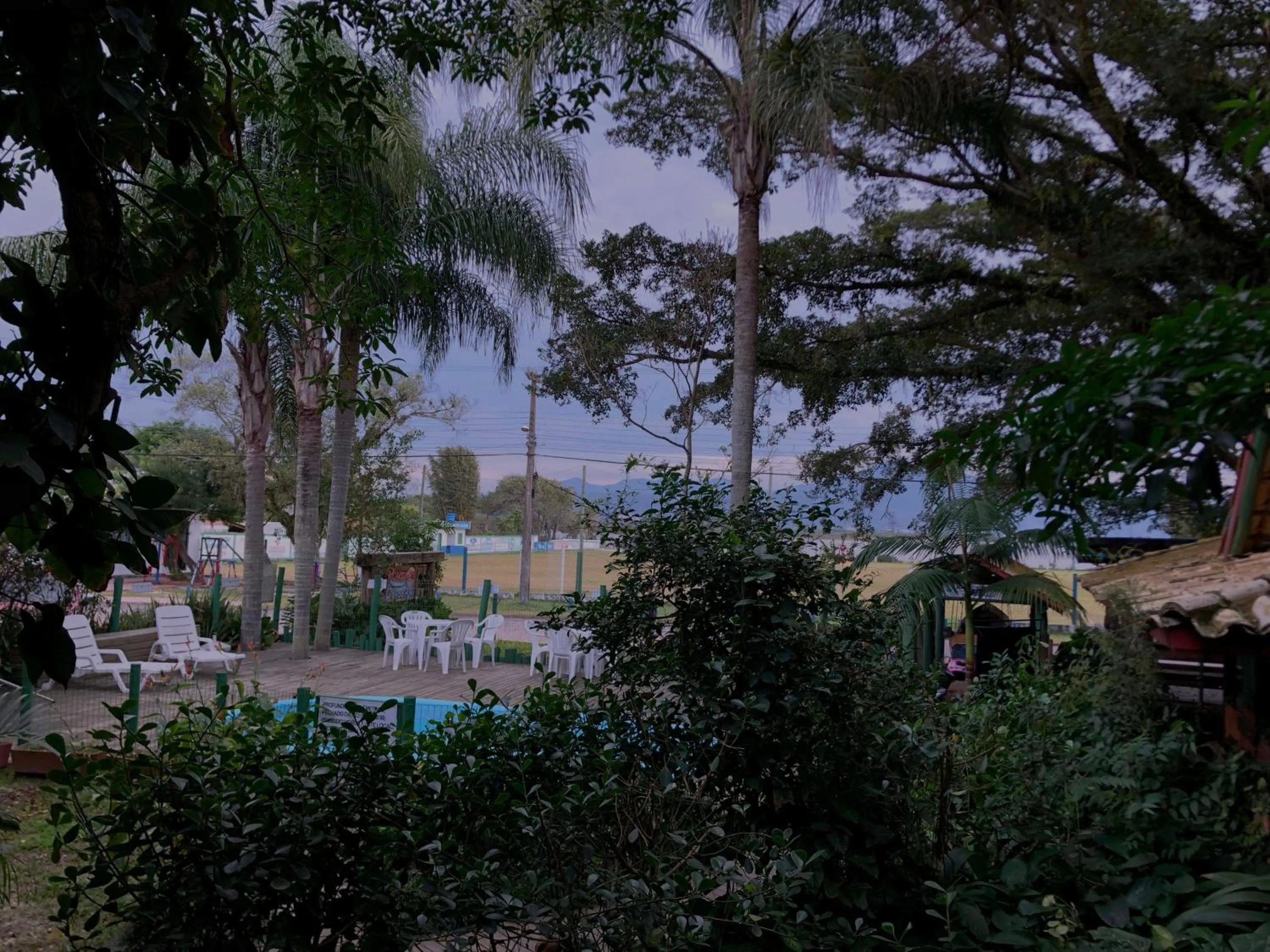 Garden view in Pousada Canoa Azul na Praia da Ferrugem