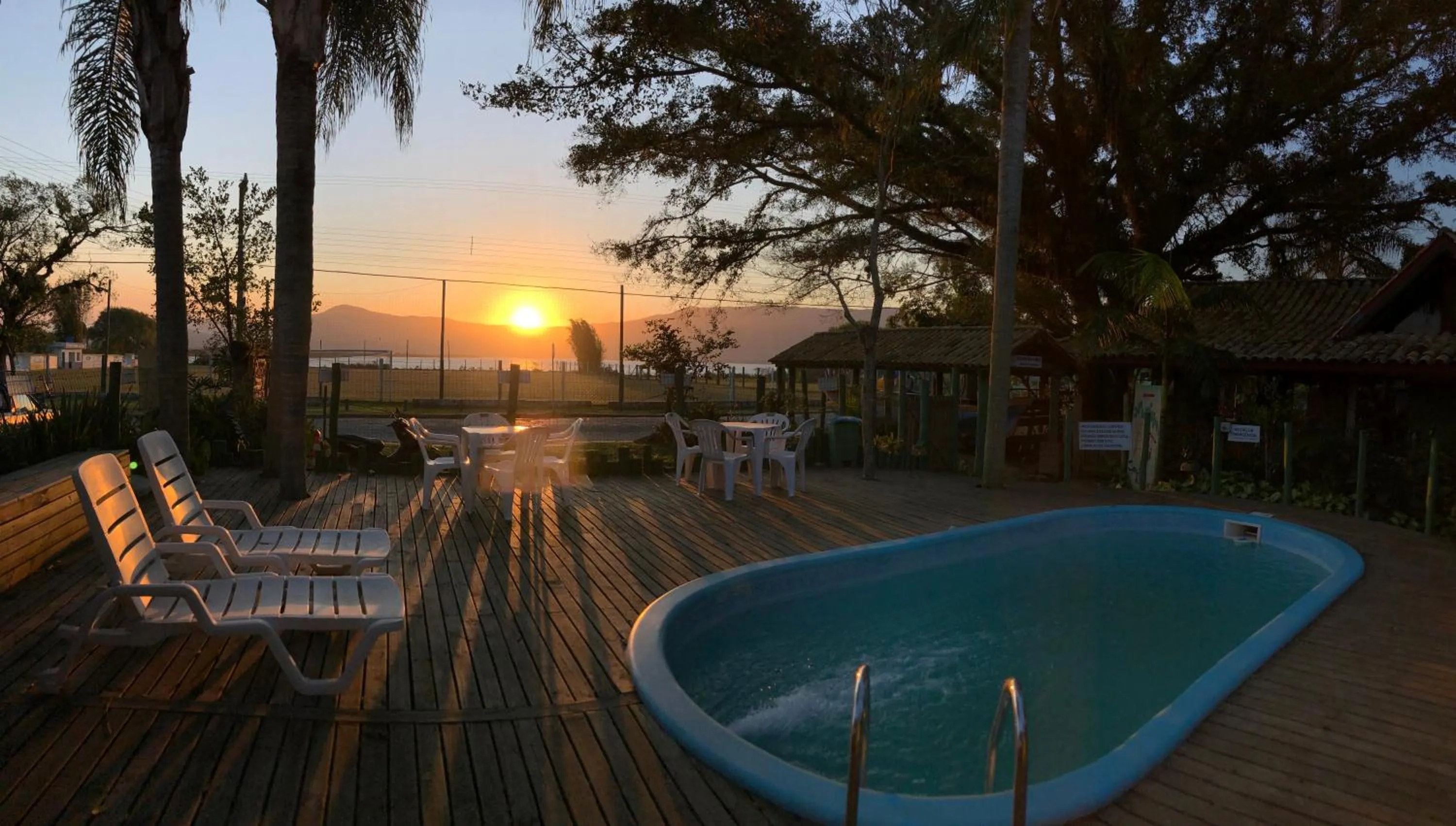 Swimming pool in Pousada Canoa Azul na Praia da Ferrugem