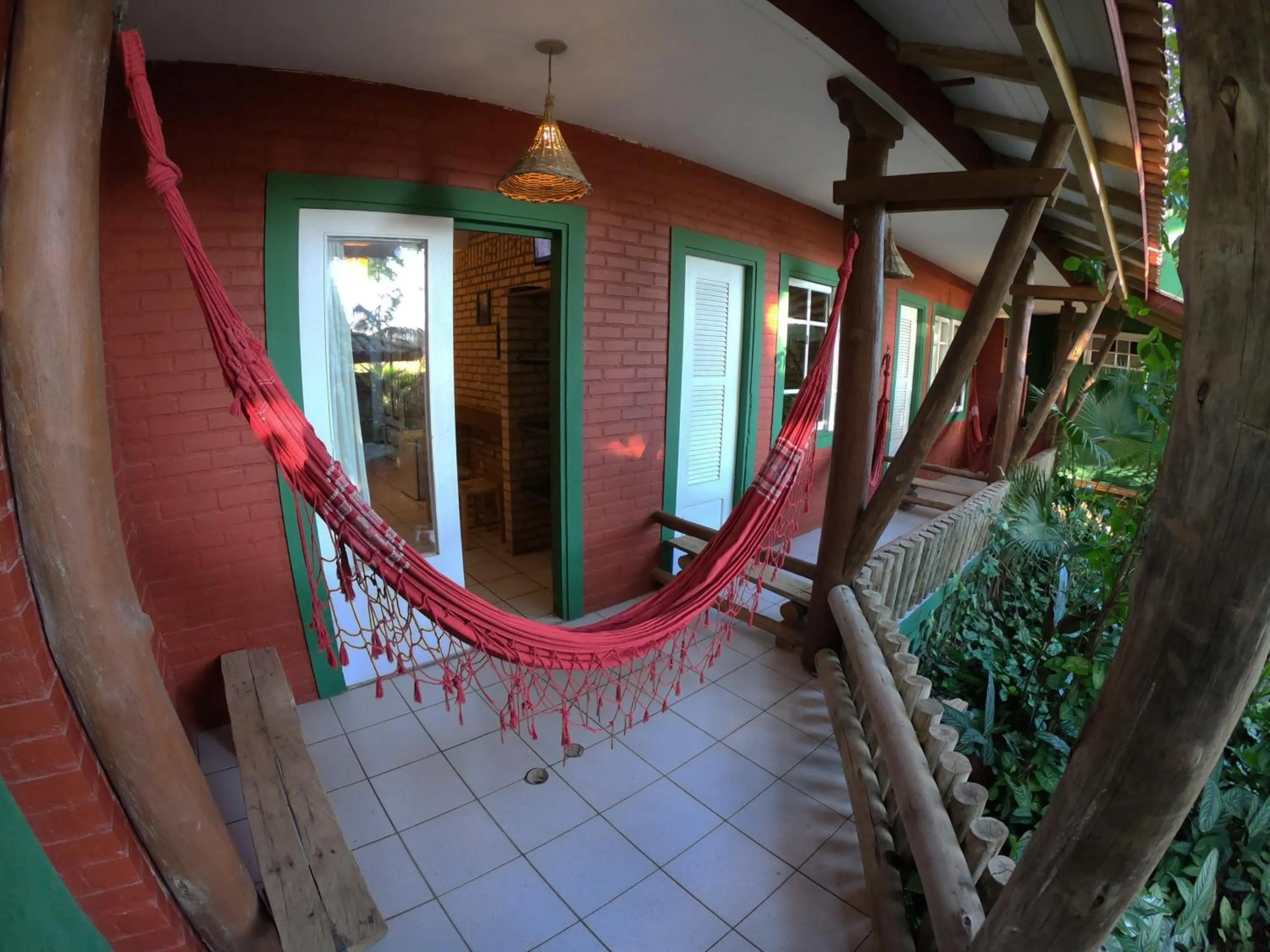 Garden in Pousada Canoa Azul na Praia da Ferrugem