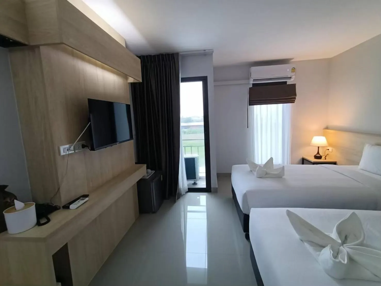 Bed in Sasi Nonthaburi Hotel