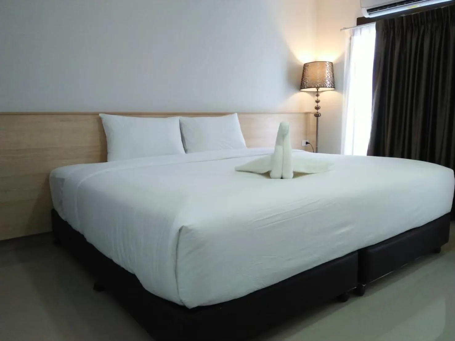 Bed in Sasi Nonthaburi Hotel