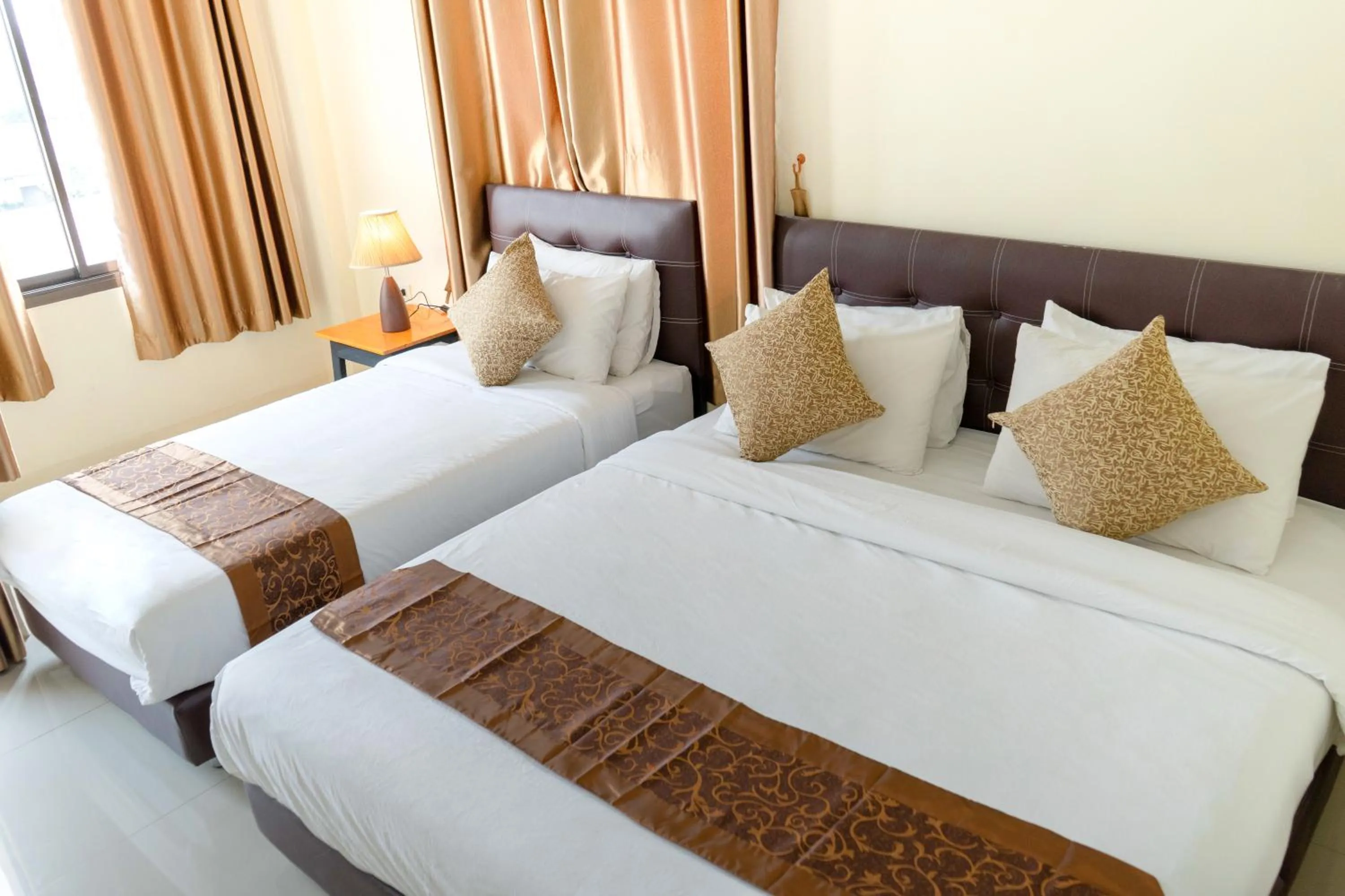 Bed in Sasi Nonthaburi Hotel