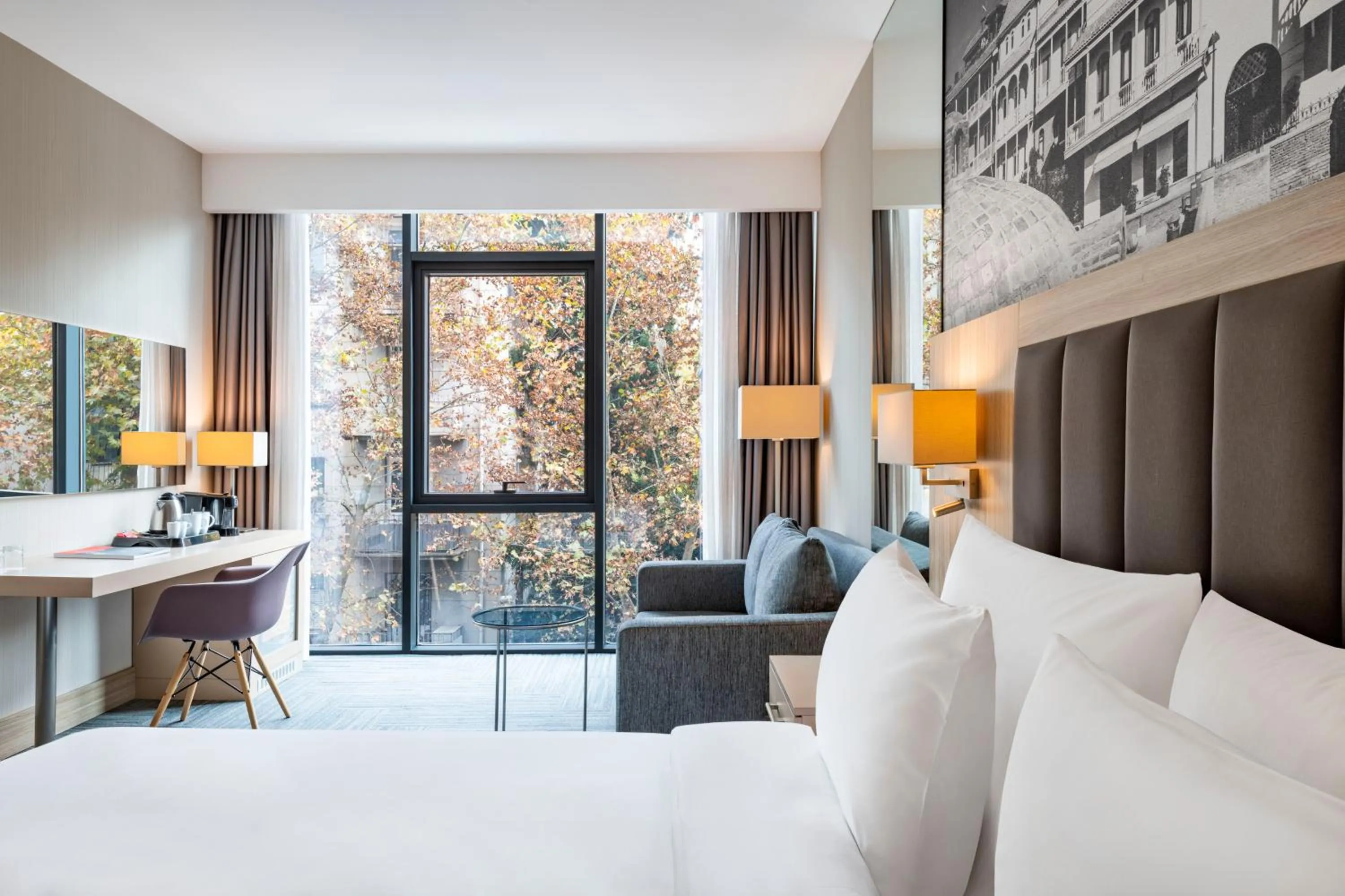 Bed in Ramada Encore Tbilisi