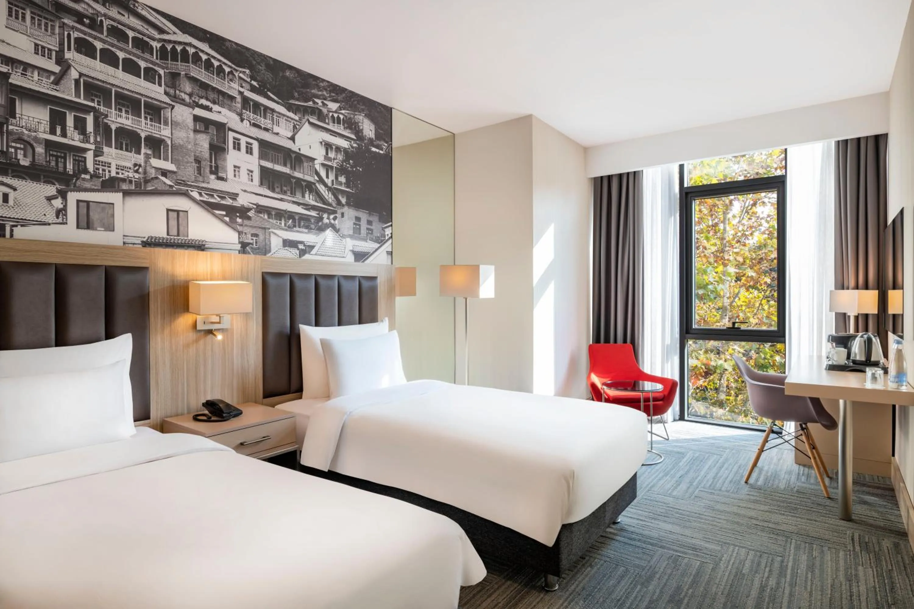 Bed in Ramada Encore Tbilisi