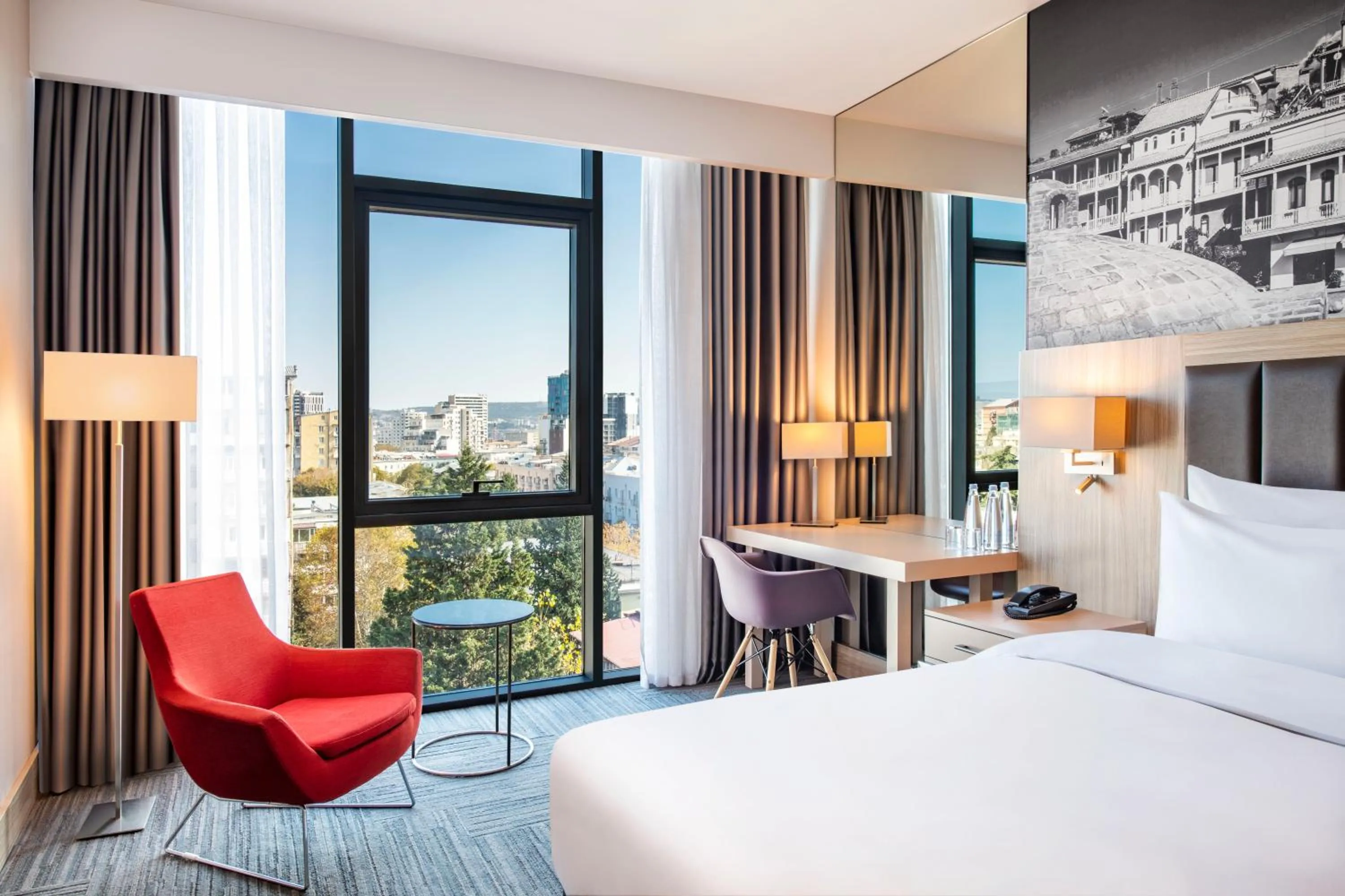 Bed in Ramada Encore Tbilisi