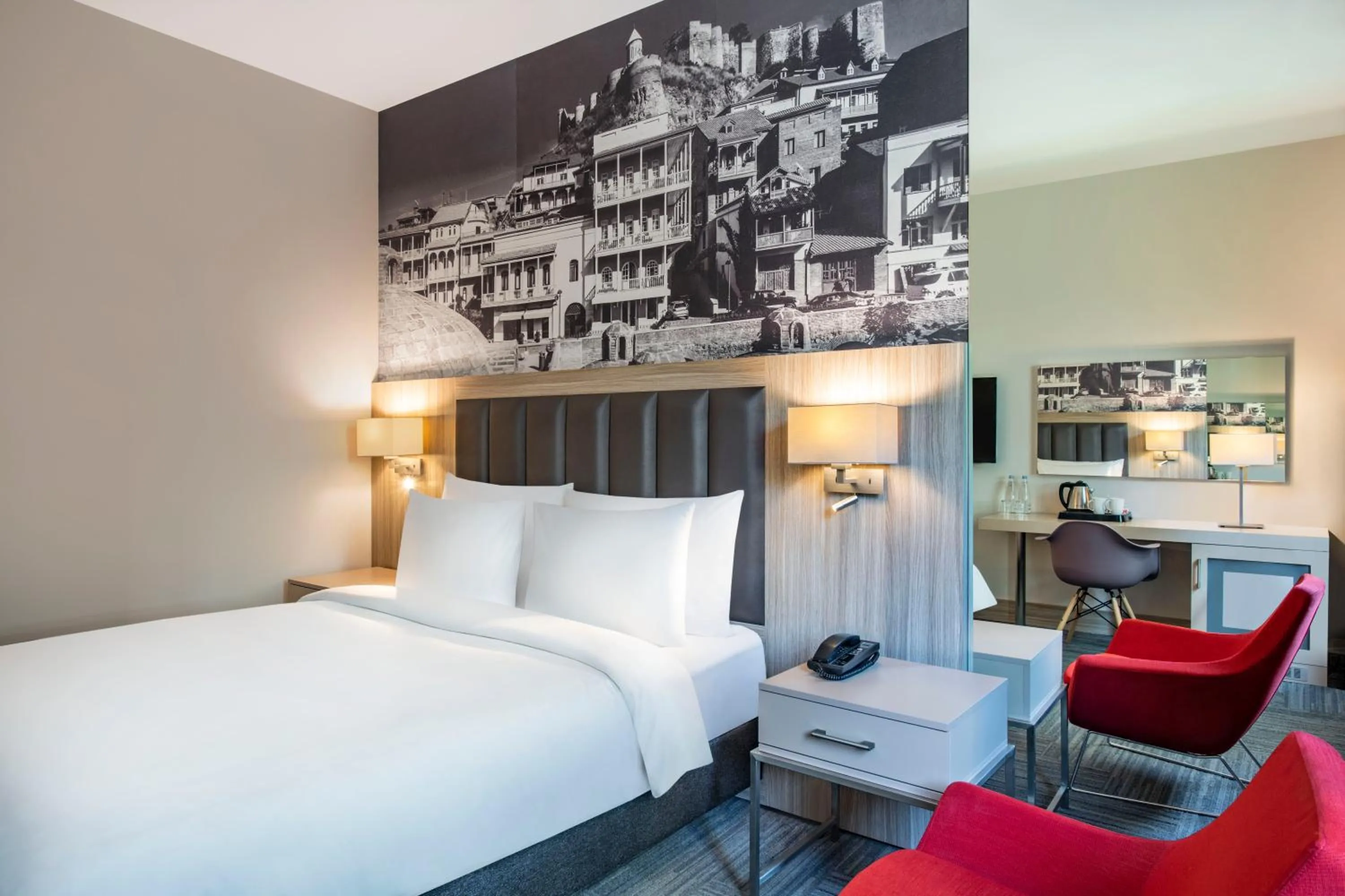 Bed in Ramada Encore Tbilisi