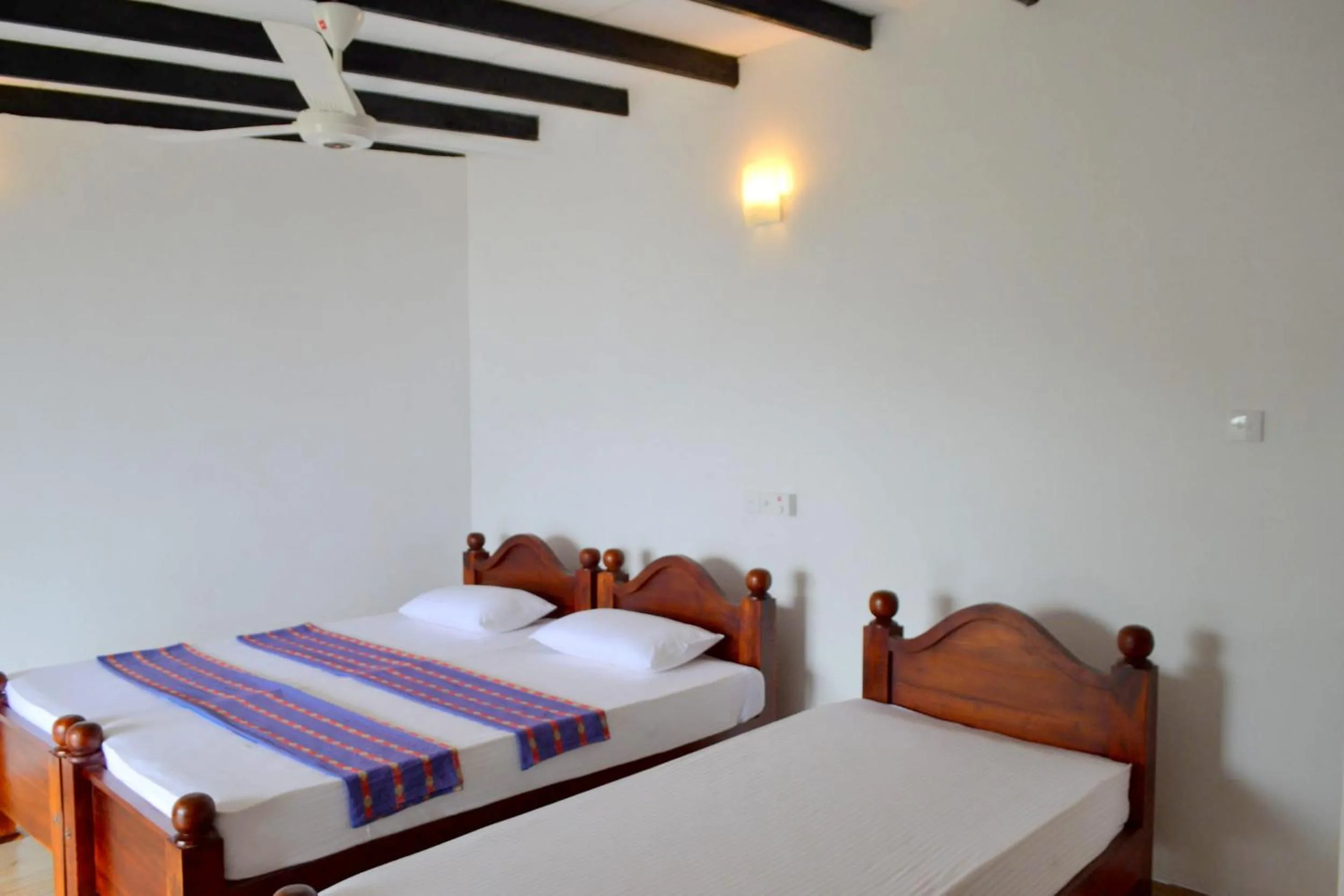 Bed in Hotel Breeta's Garden