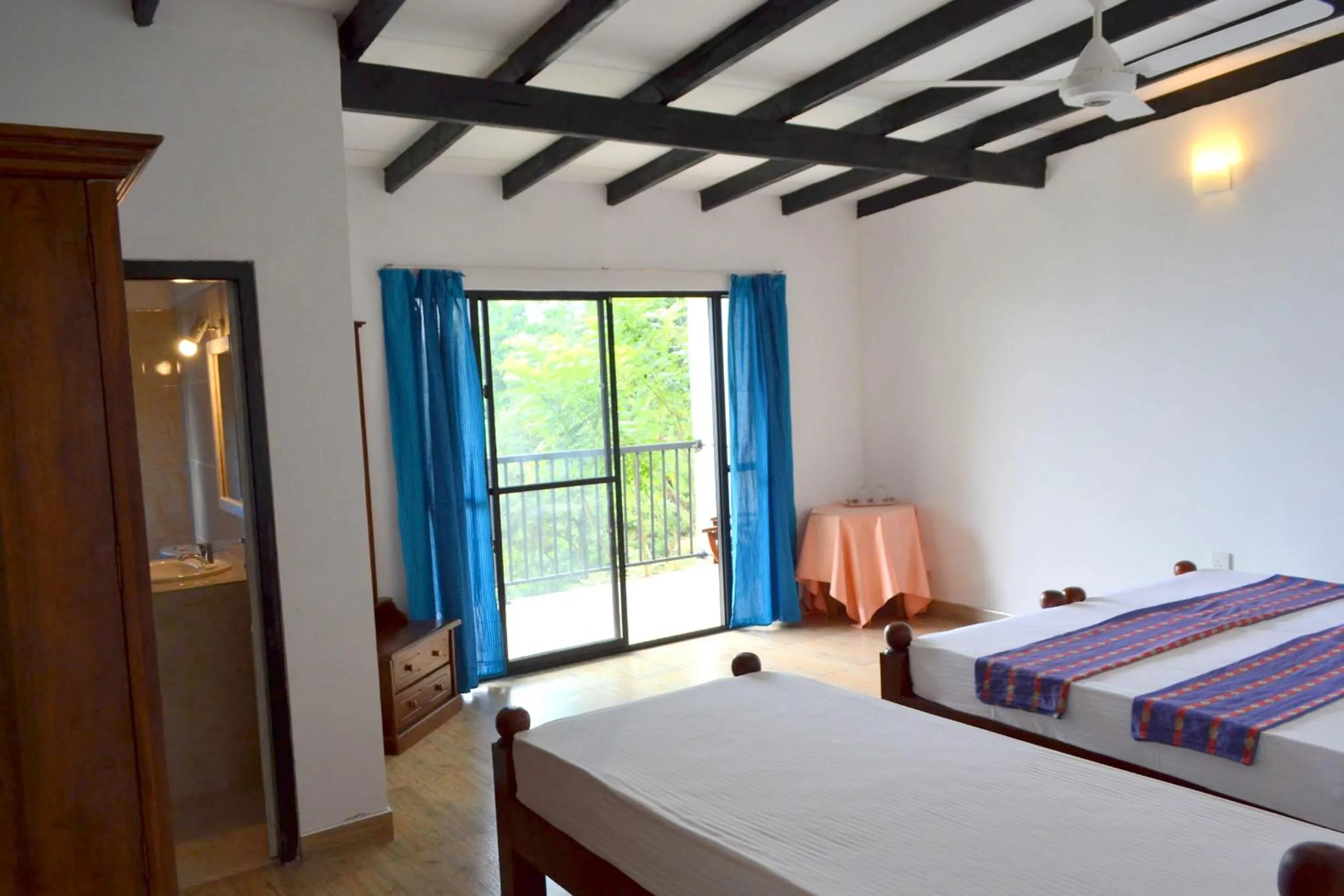 Bed in Hotel Breeta's Garden