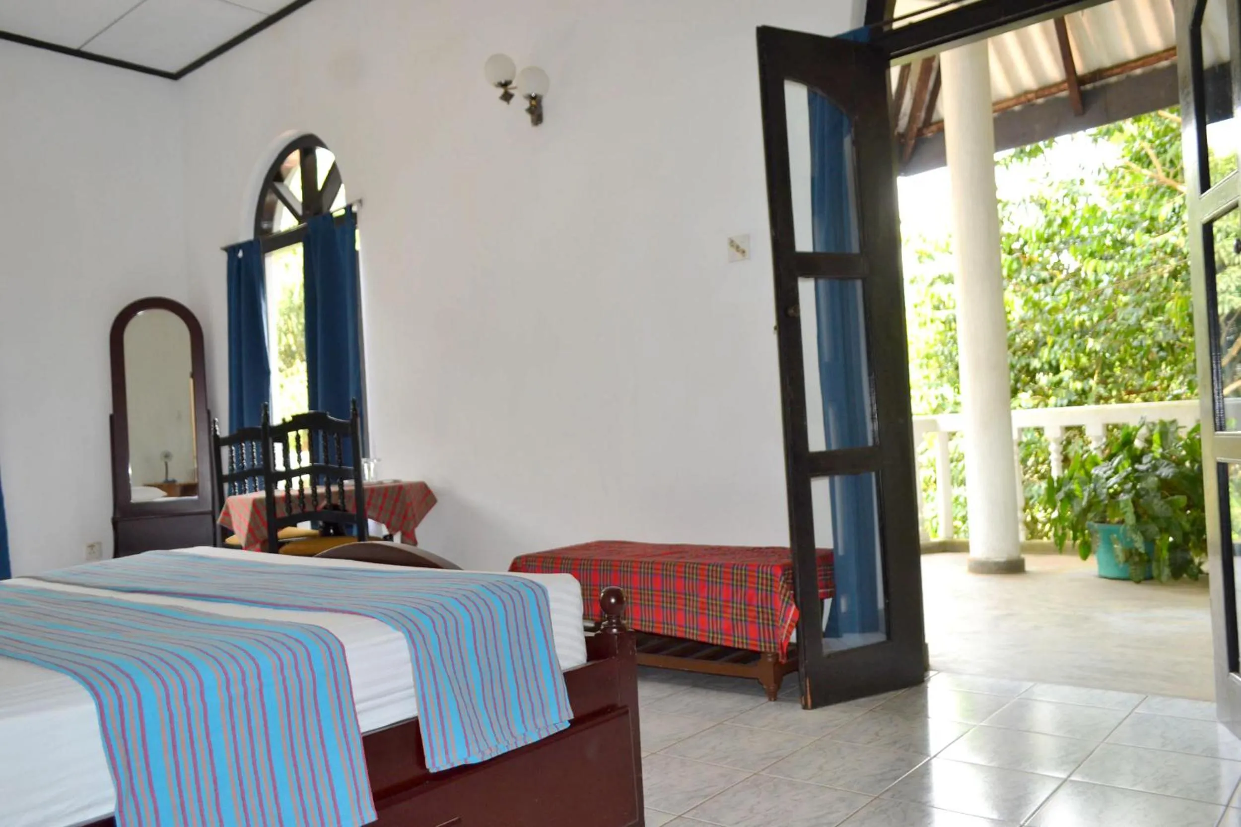 Bed in Hotel Breeta's Garden