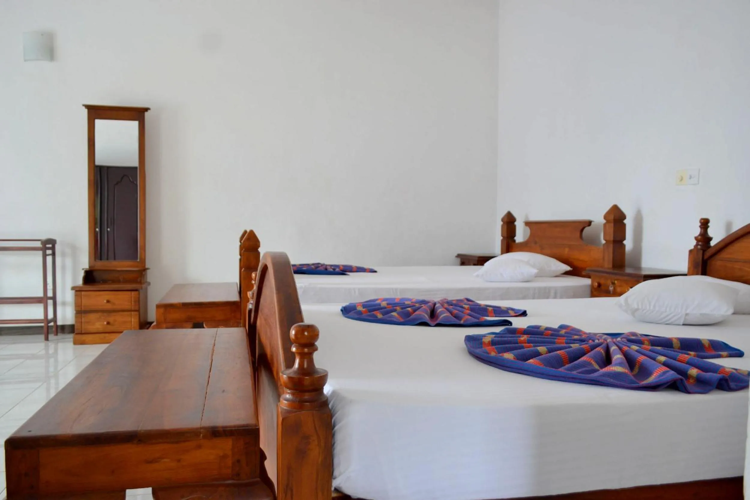 Bed in Hotel Breeta's Garden