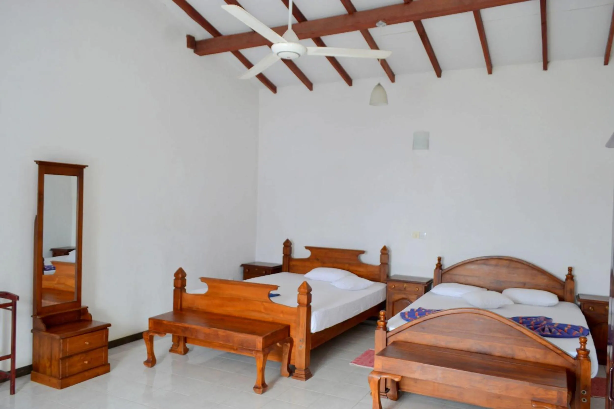 Bed in Hotel Breeta's Garden