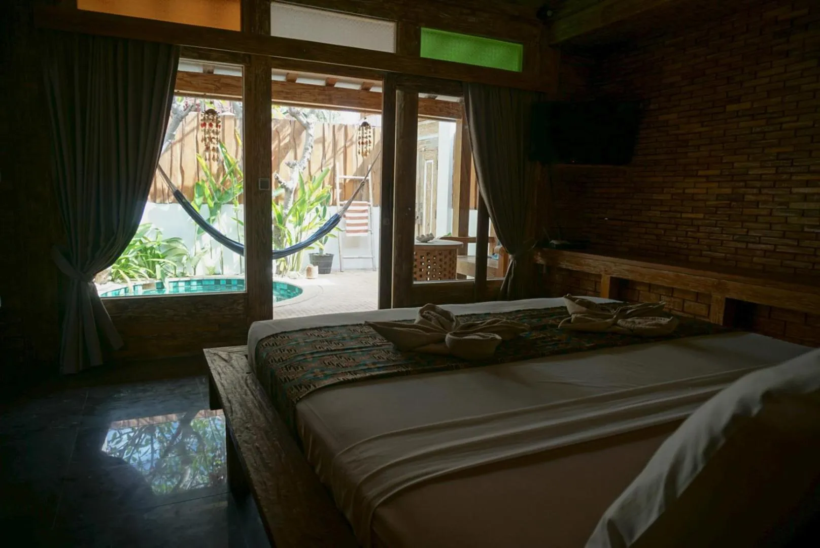 Bed in Jawa House Private Villas