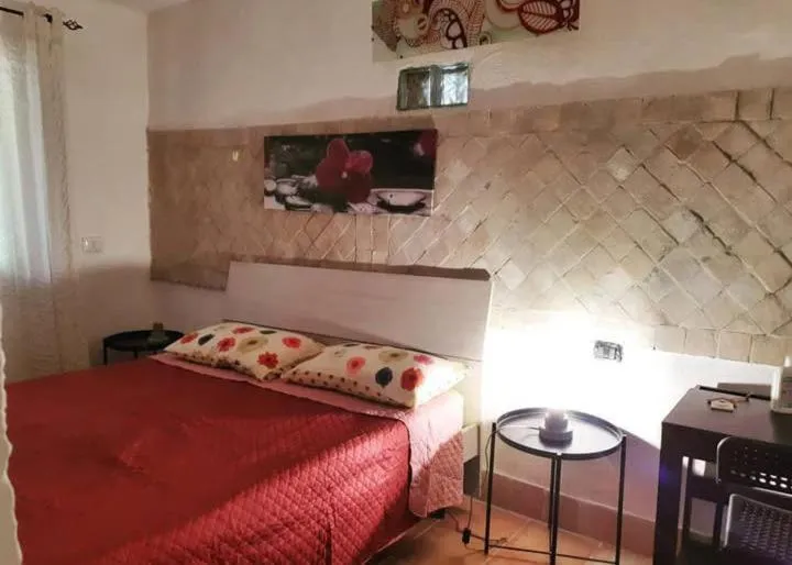 Bed in LA GROTTA Bed and Breakfast