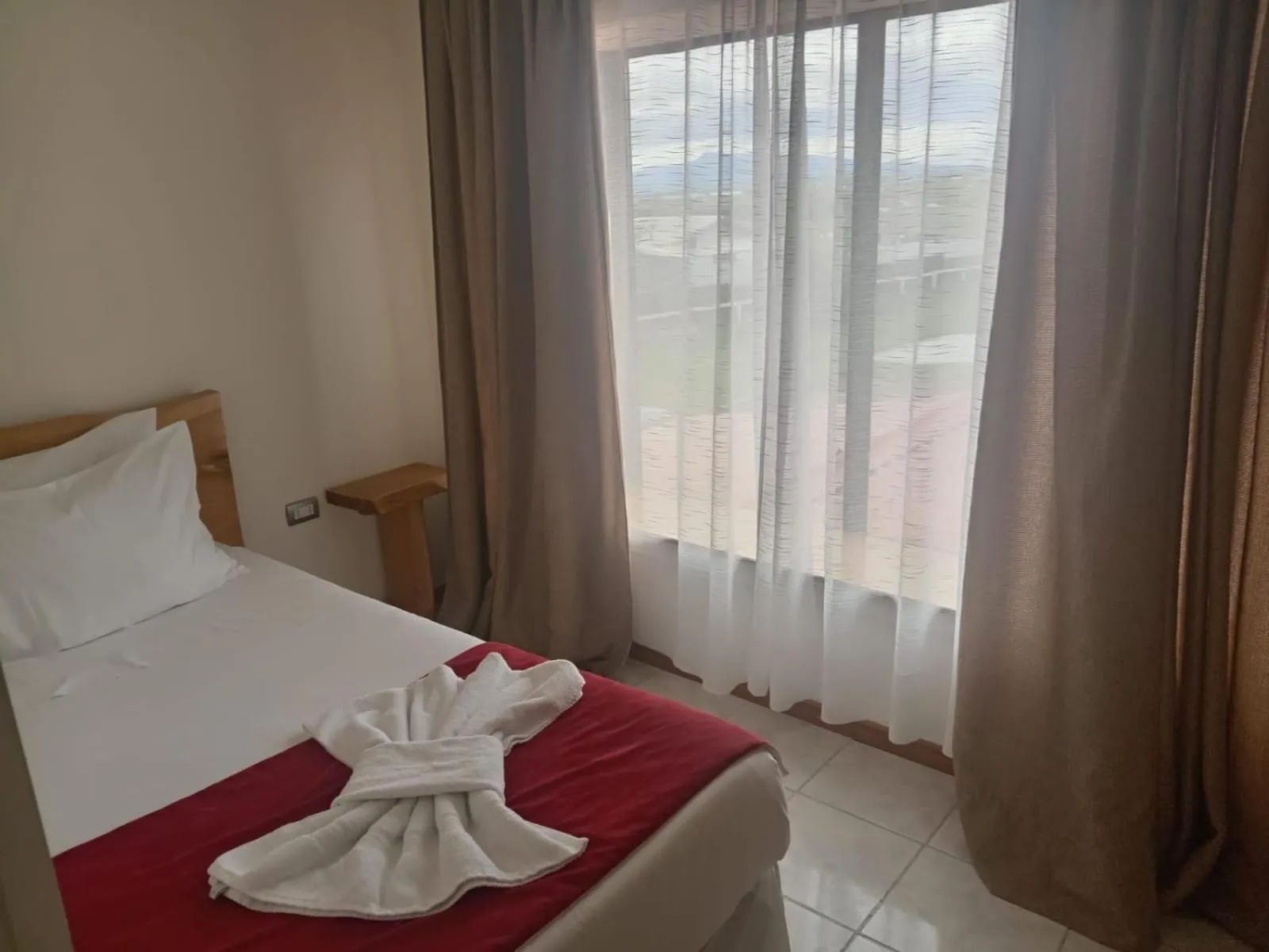 Photo of the whole room, Bed in Hostal Doble E Patagonia