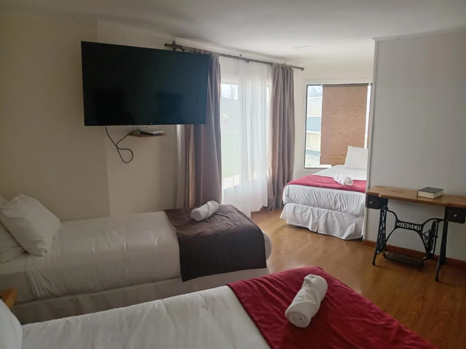 Photo of the whole room, Bed in Hostal Doble E Patagonia