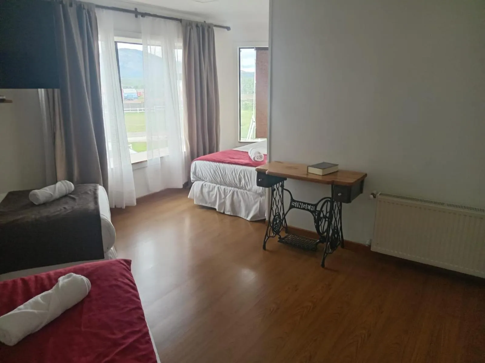 Photo of the whole room, Bed in Hostal Doble E Patagonia