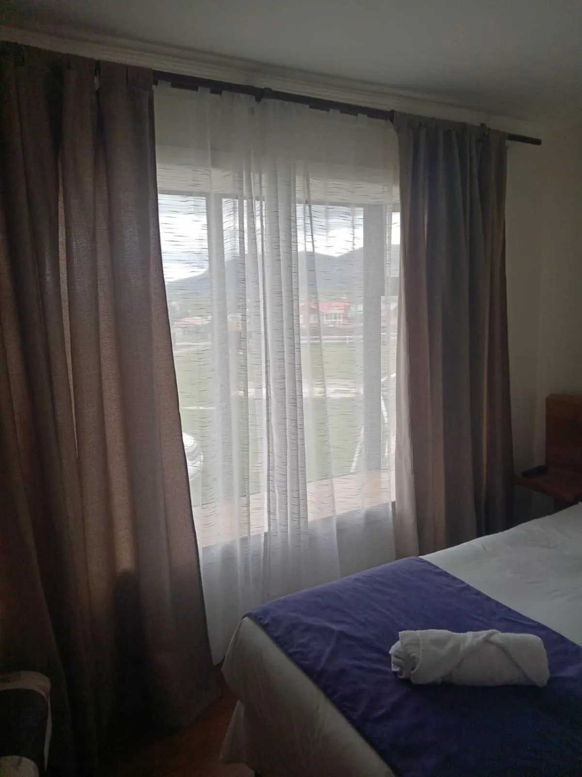 Photo of the whole room, Bed in Hostal Doble E Patagonia