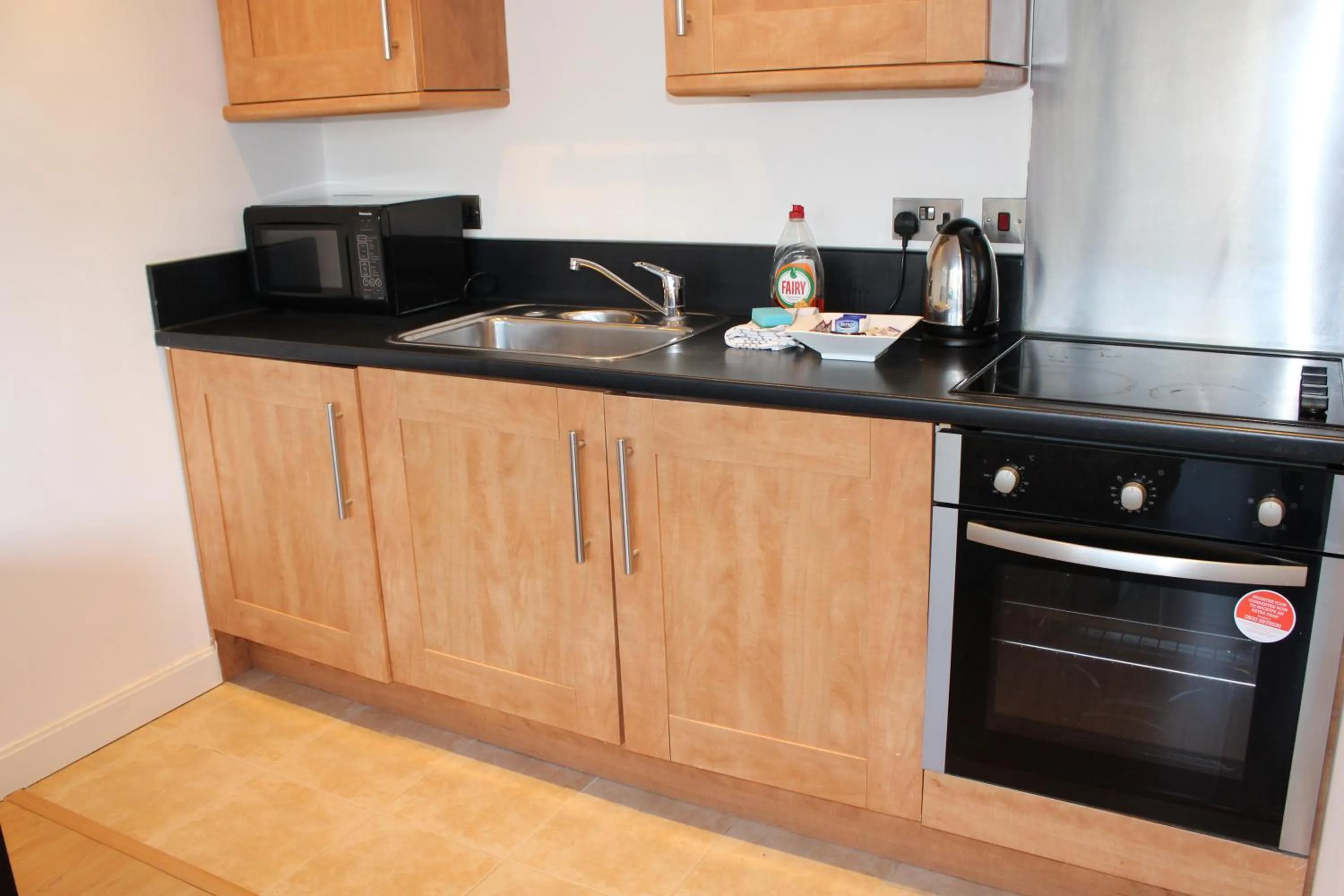 Kitchen or kitchenette in Empire Serviced Apartments