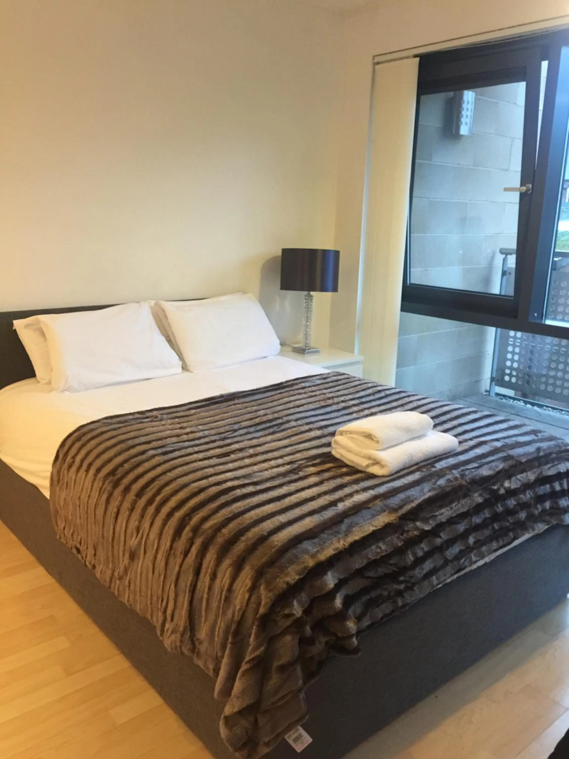 Bedroom, Bed in Empire Serviced Apartments