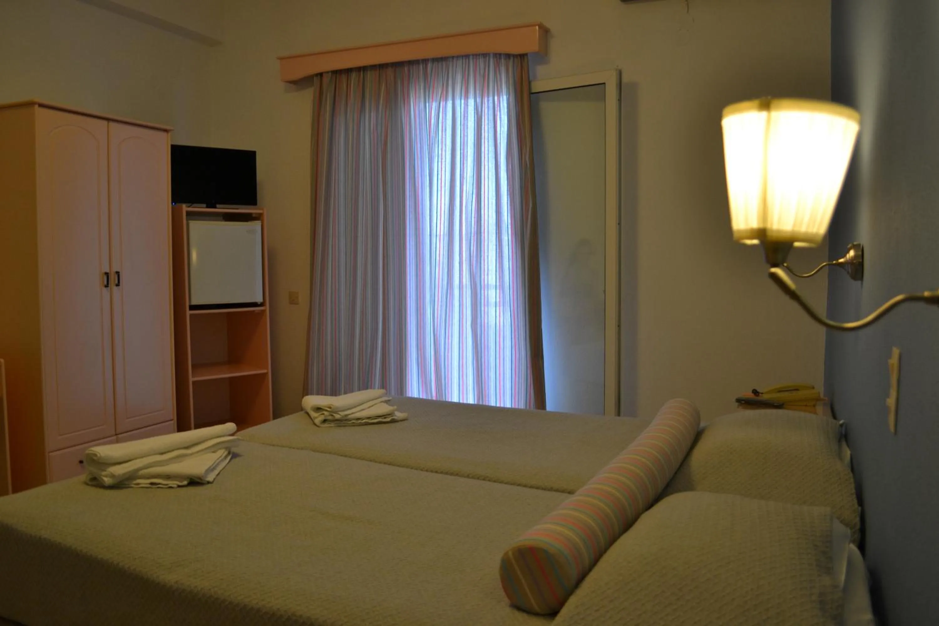 Bed in Ifigenia Hotel