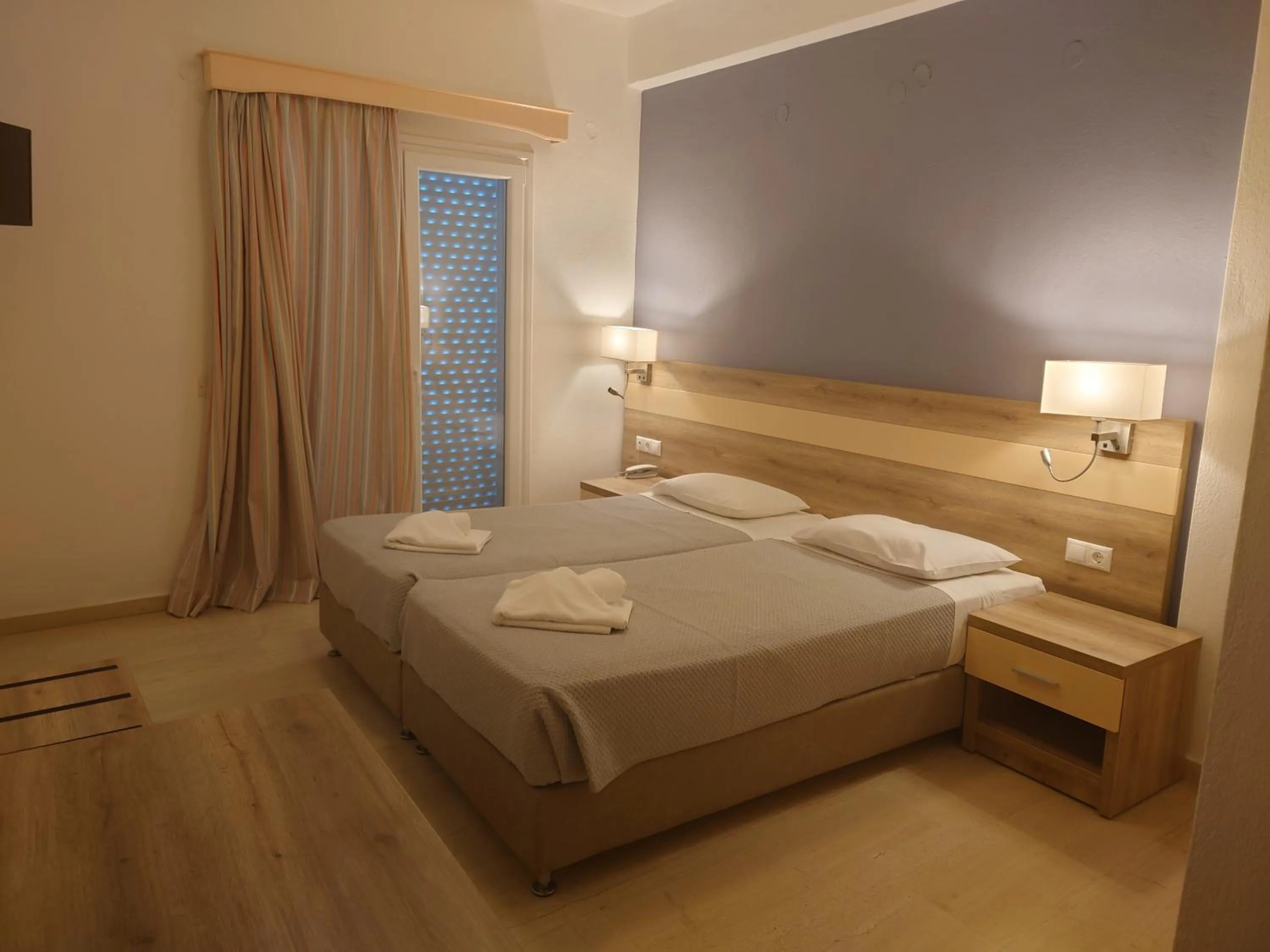Bed in Ifigenia Hotel