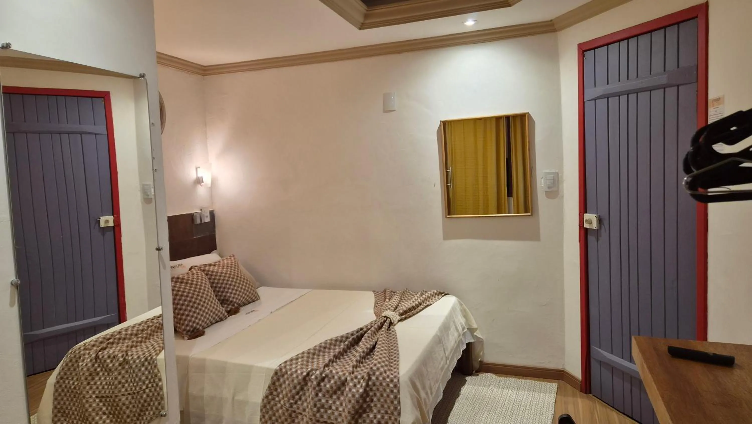Bed in Pousada Uai Tiradentes