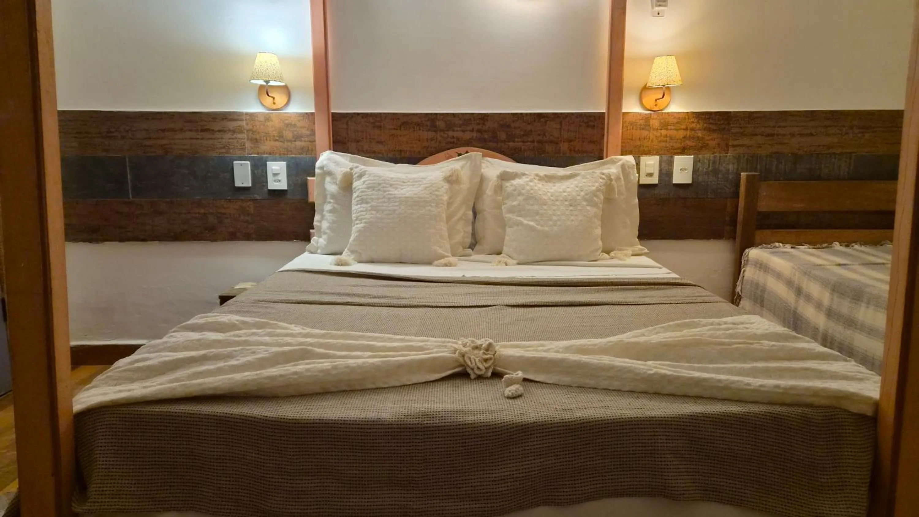 Bed in Pousada Uai Tiradentes