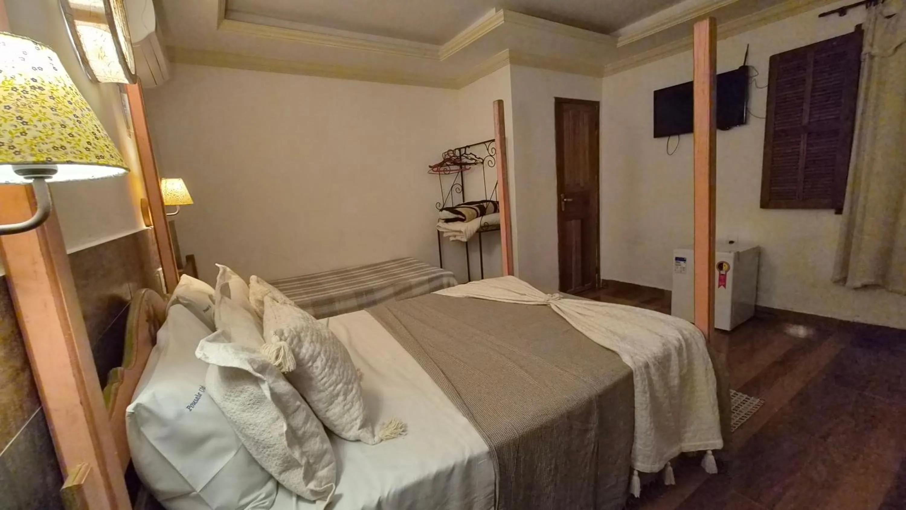 Bed in Pousada Uai Tiradentes