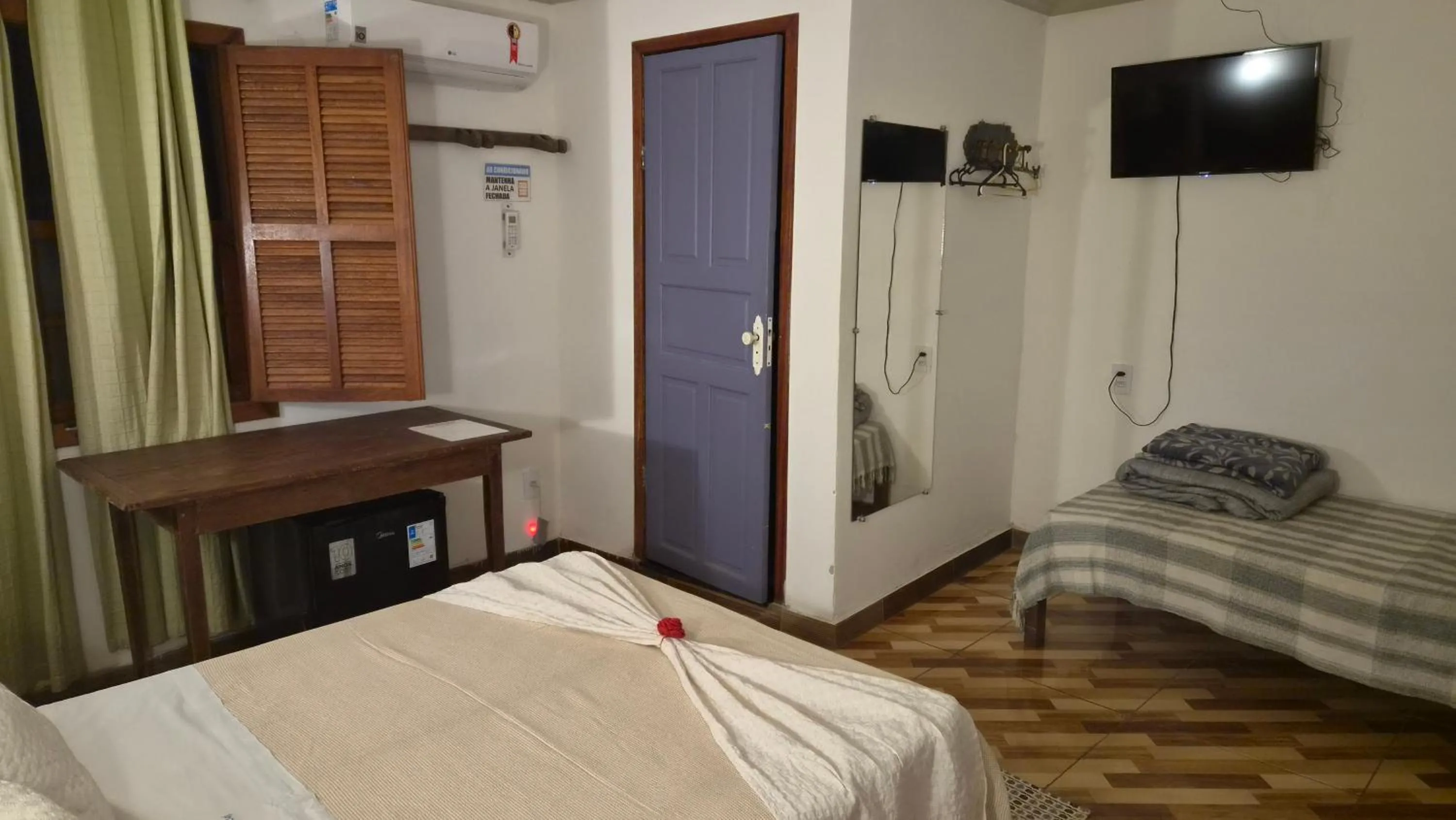 Bed in Pousada Uai Tiradentes