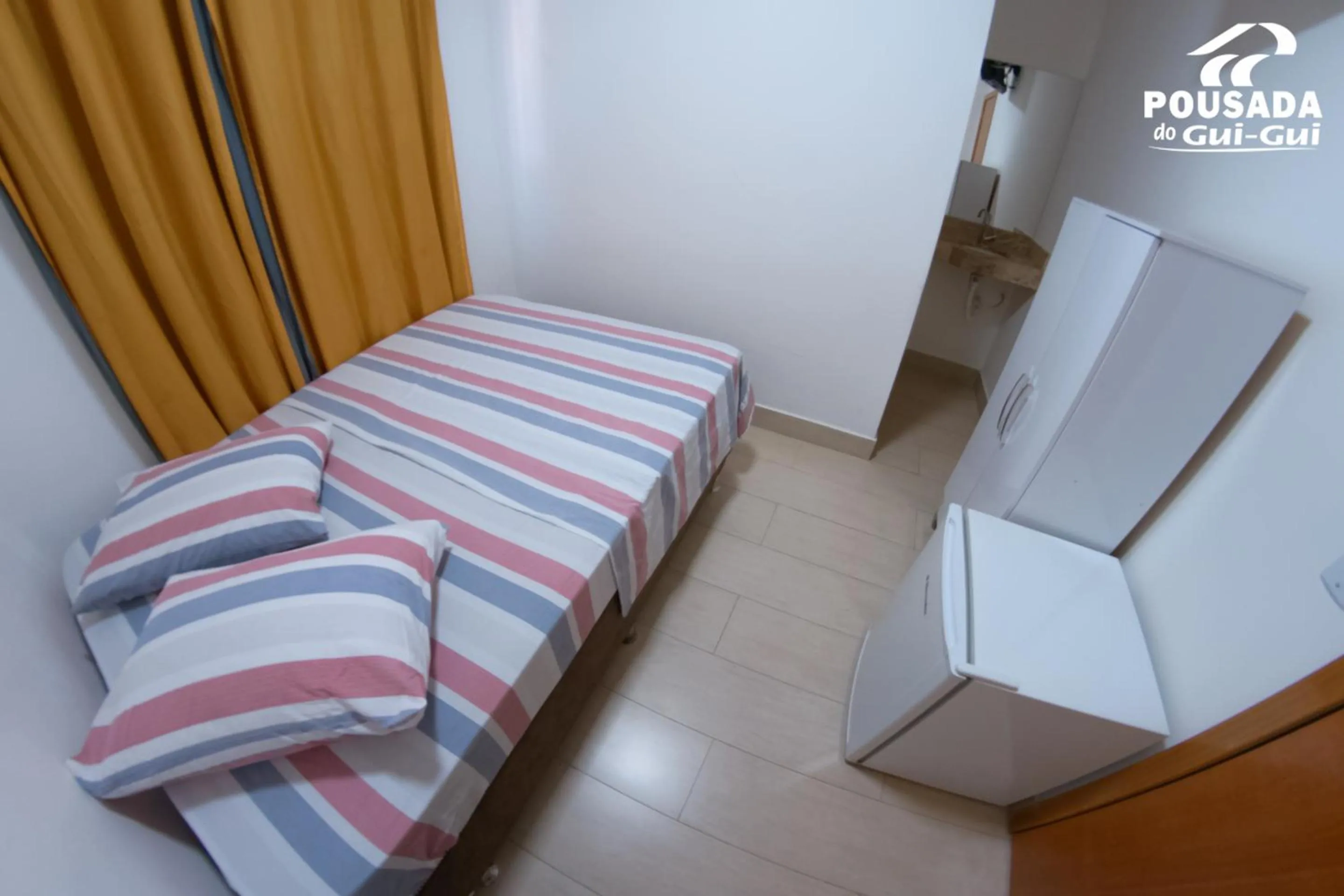 Bed in Pousada do Gui-Gui Aeroporto