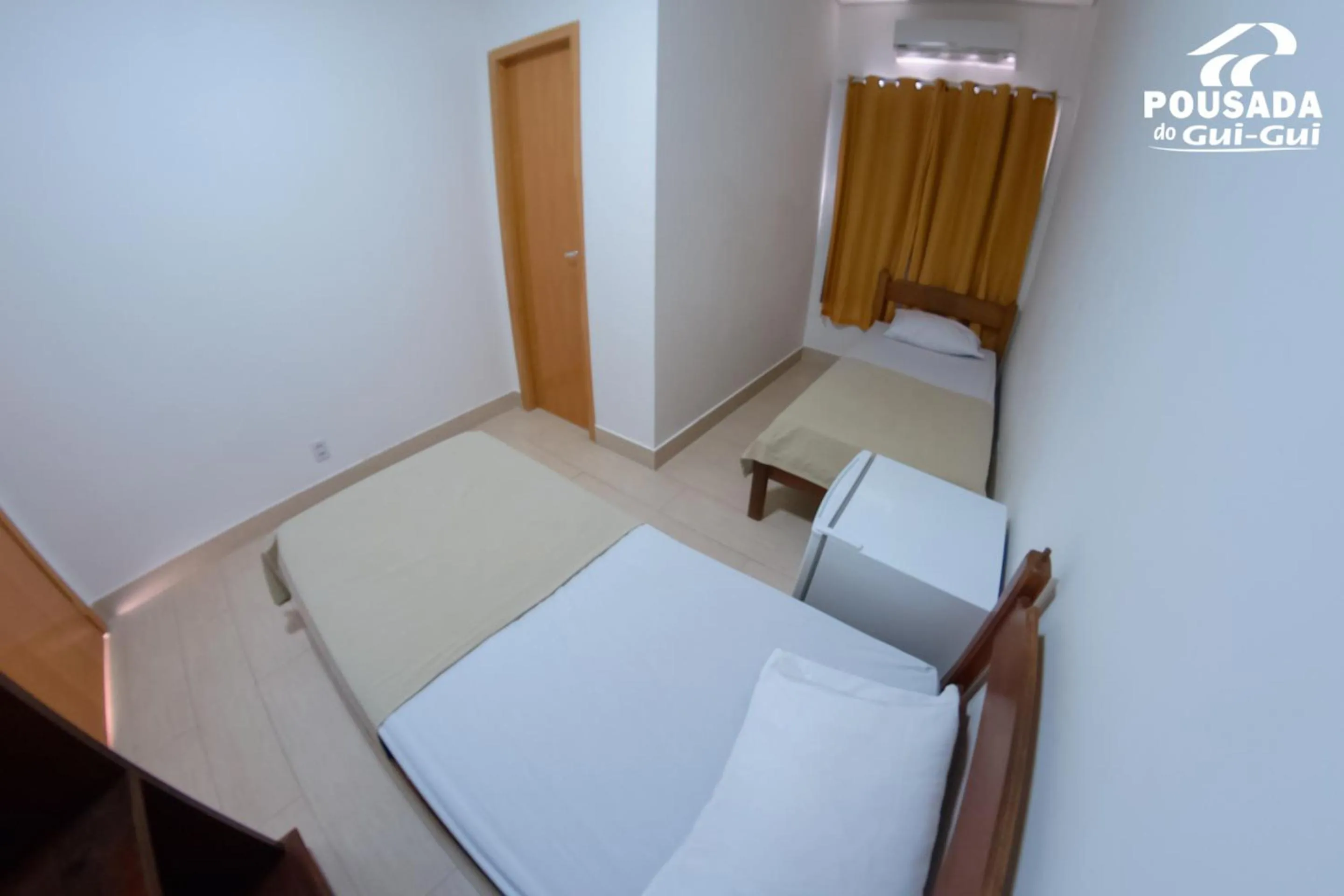 Bed in Pousada do Gui-Gui Aeroporto