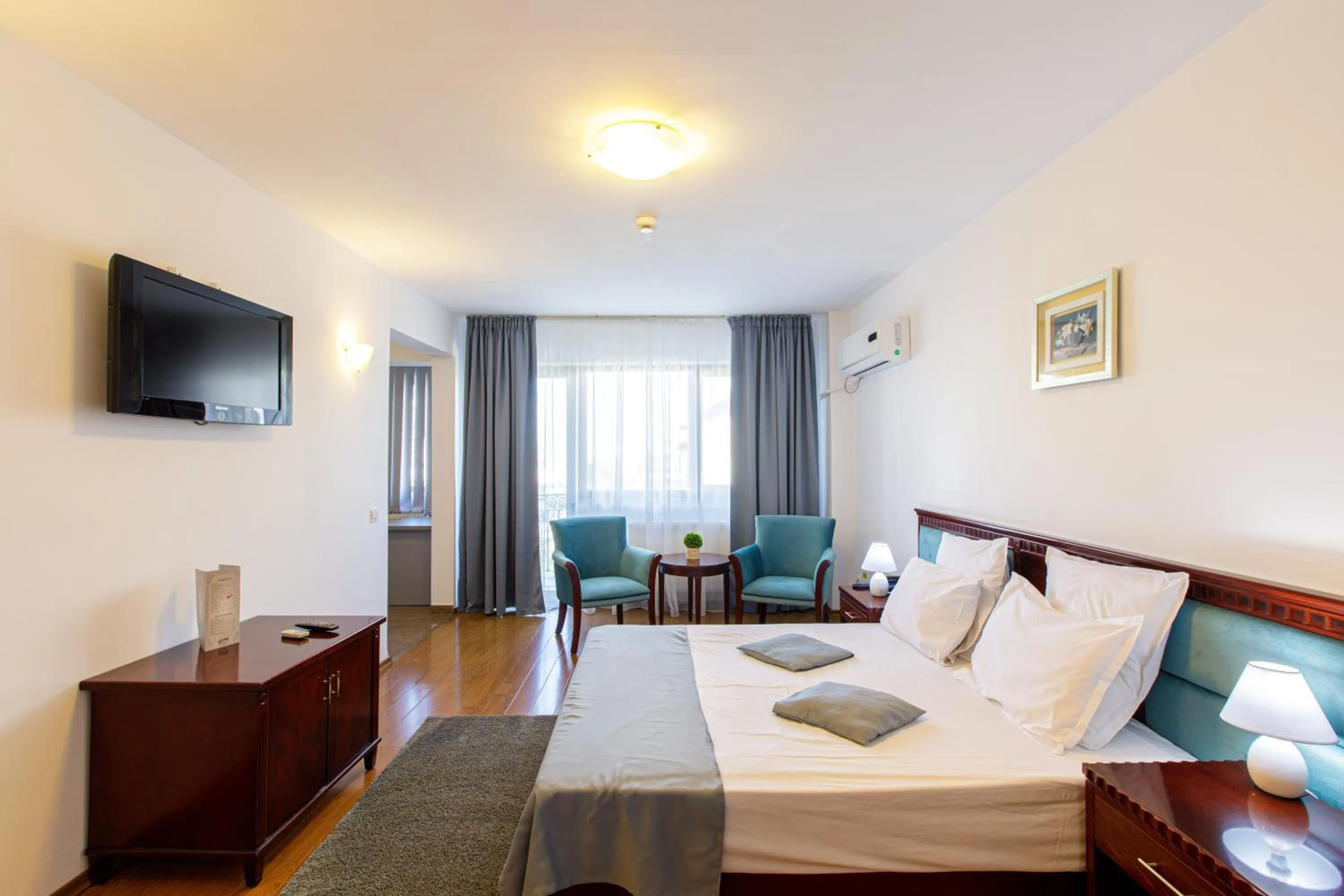 Bed in Lira Pacific Aparthotel