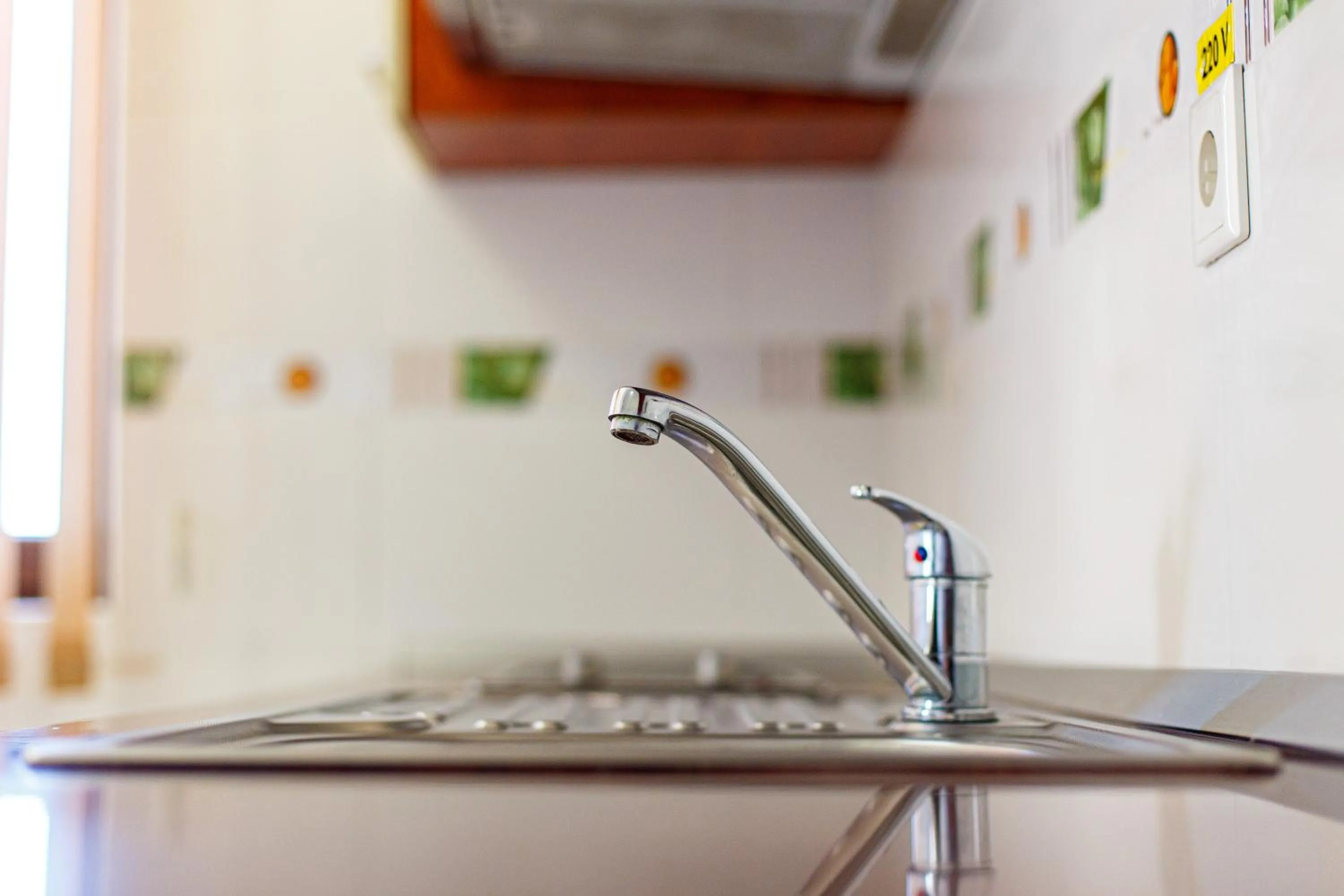 Kitchen or kitchenette in Lira Pacific Aparthotel