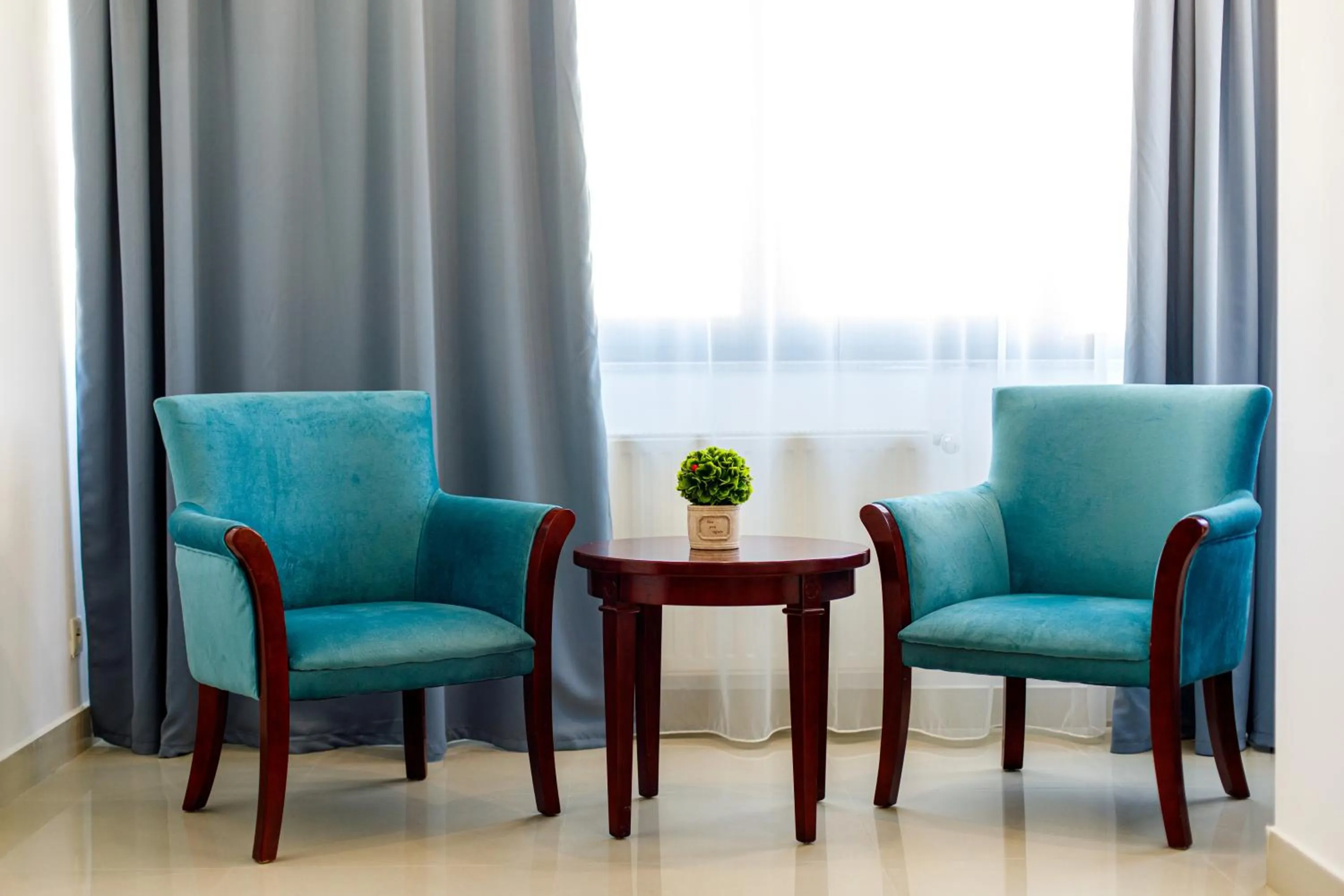 Seating area in Lira Pacific Aparthotel