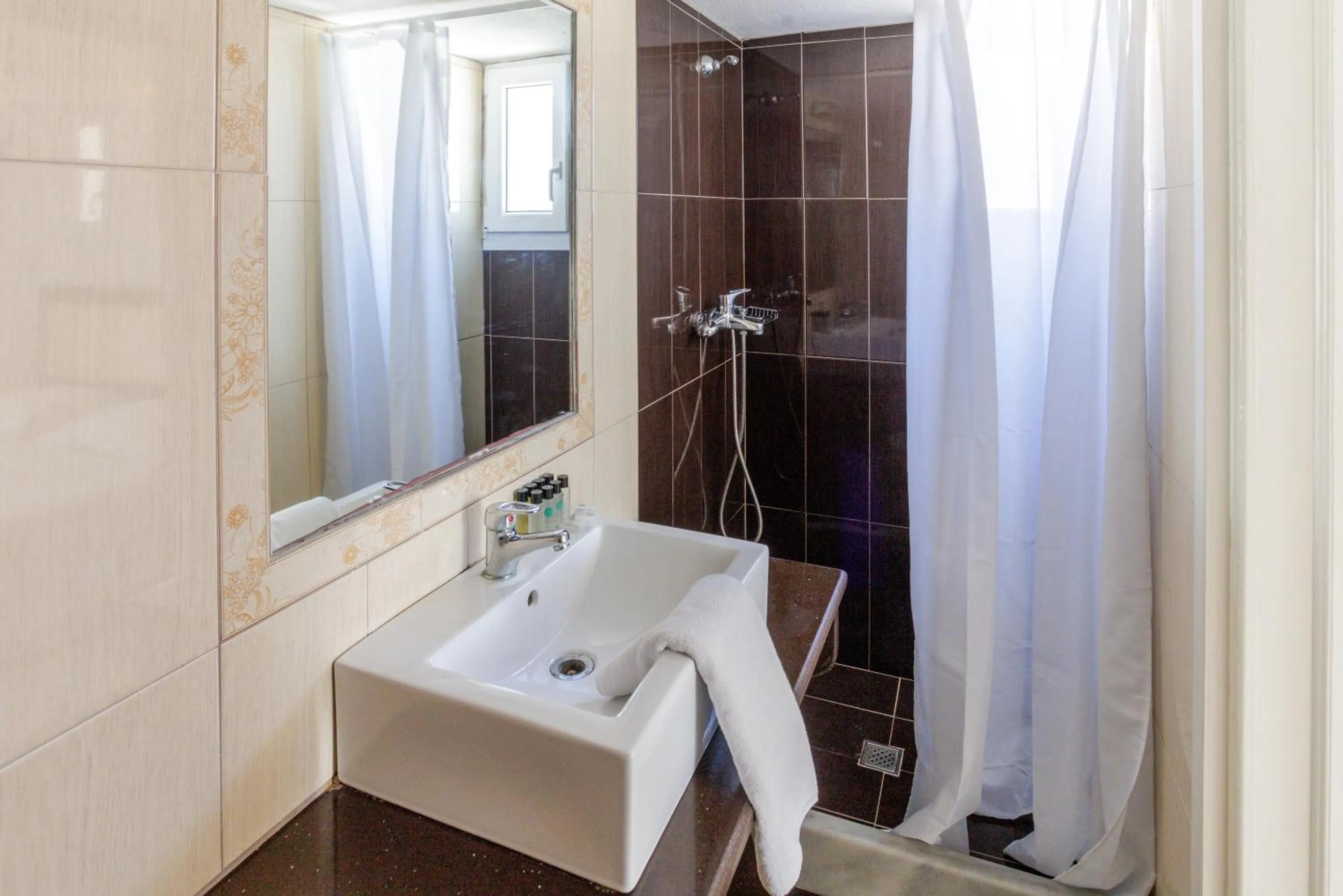Shower in Elena Studios & Suites