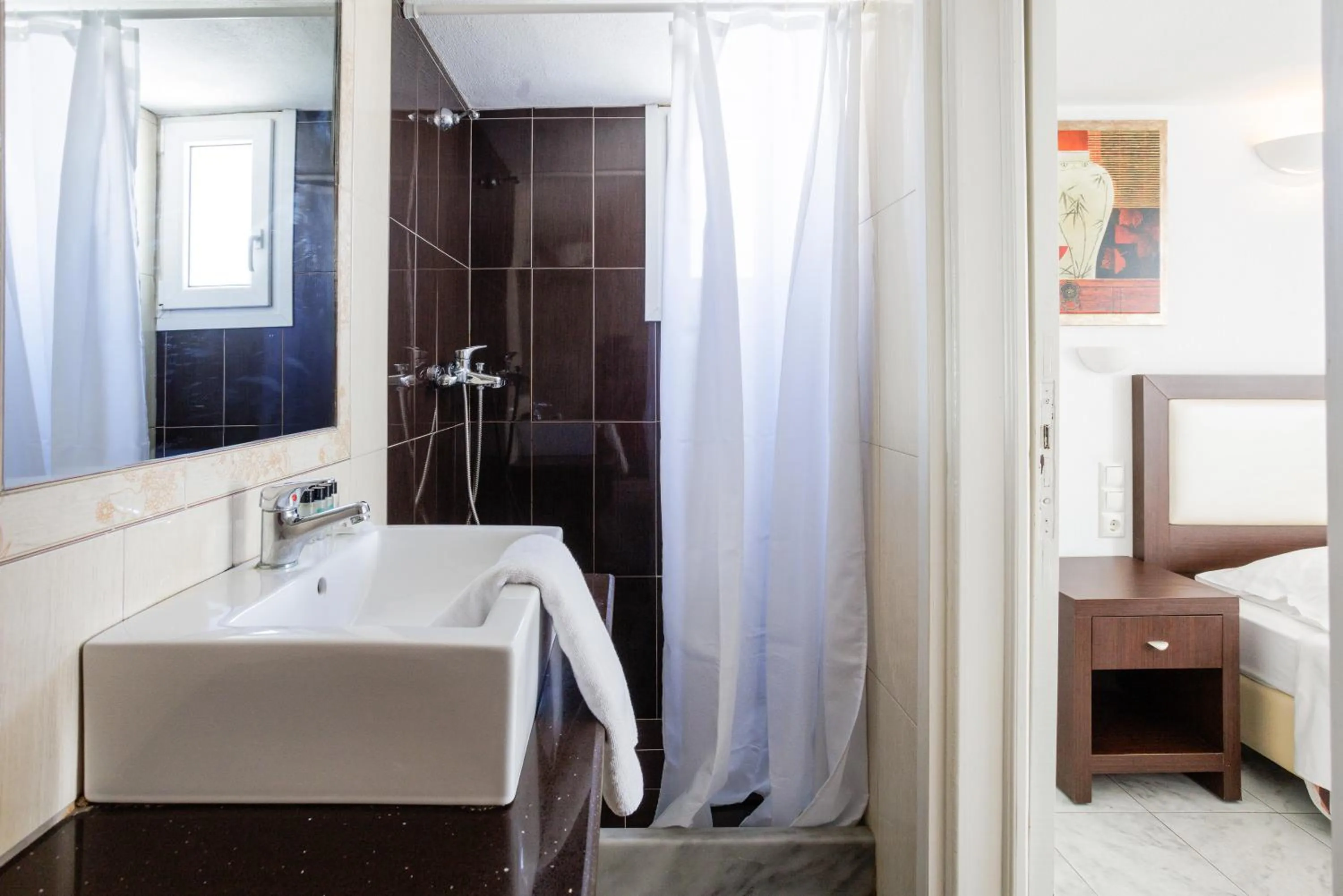 Shower, Bed in Elena Studios & Suites