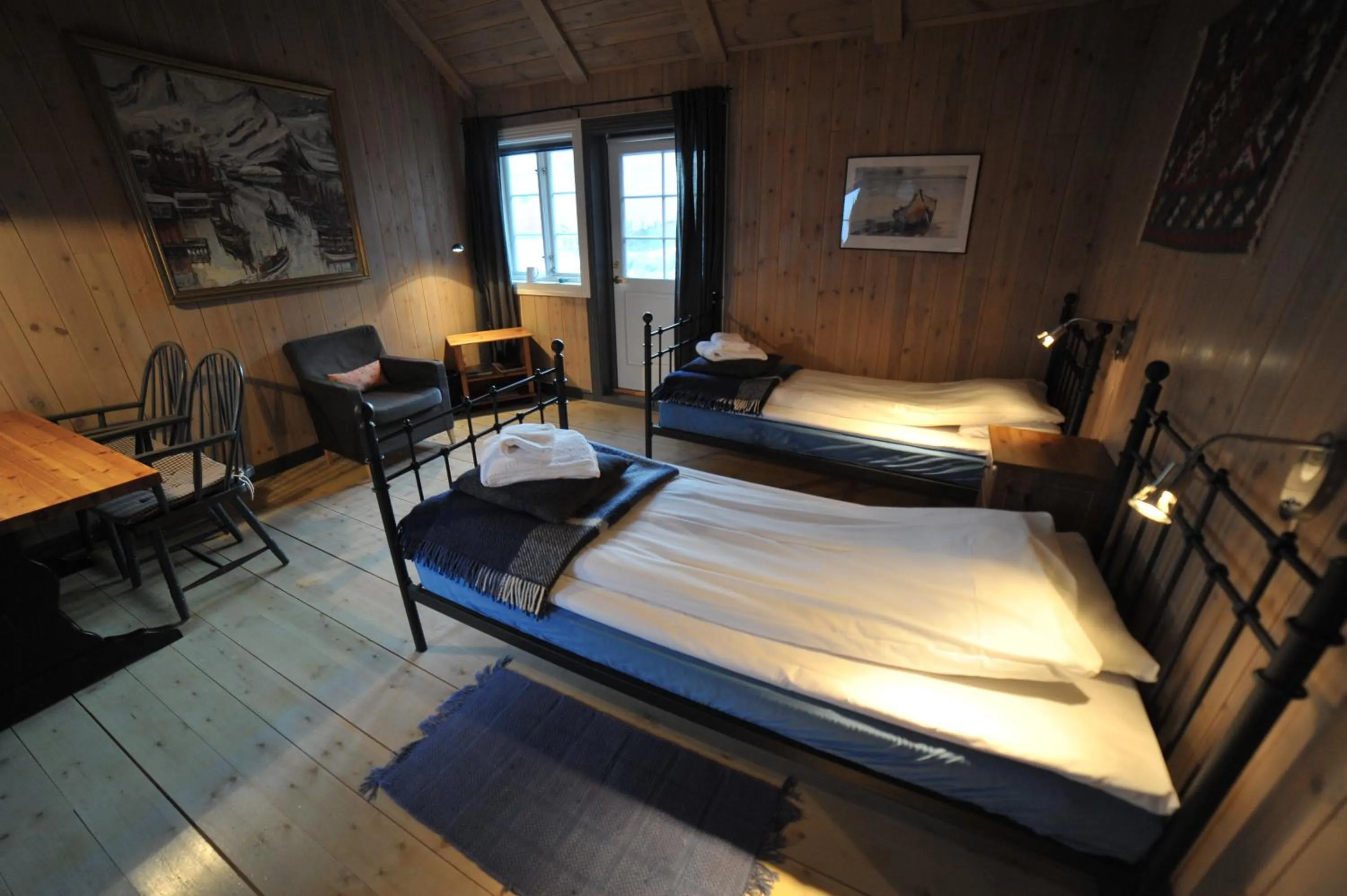 Bedroom, Bed in Reine Rorbuer - by Classic Norway Hotels