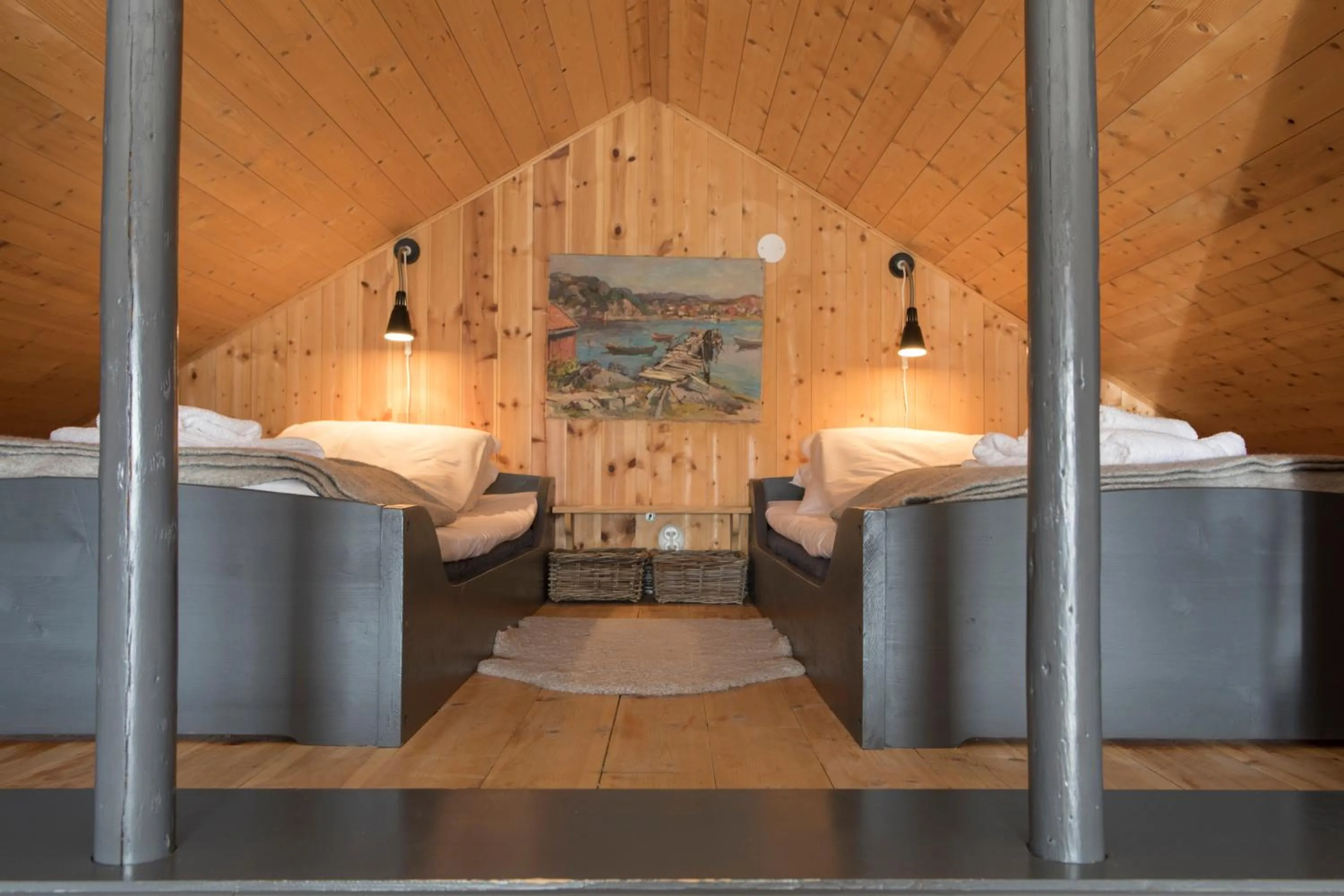 Bed in Reine Rorbuer - by Classic Norway Hotels