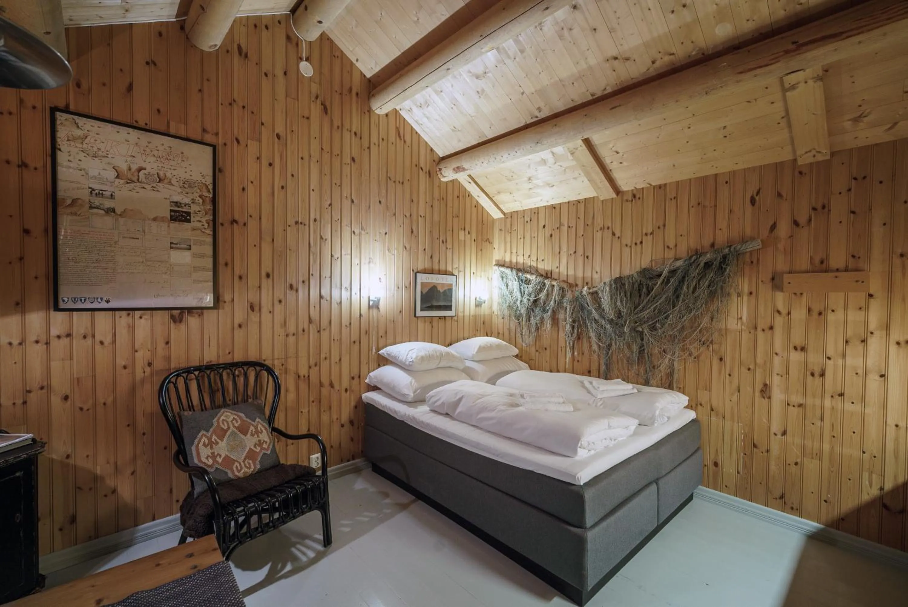 Bedroom, Bed in Reine Rorbuer - by Classic Norway Hotels
