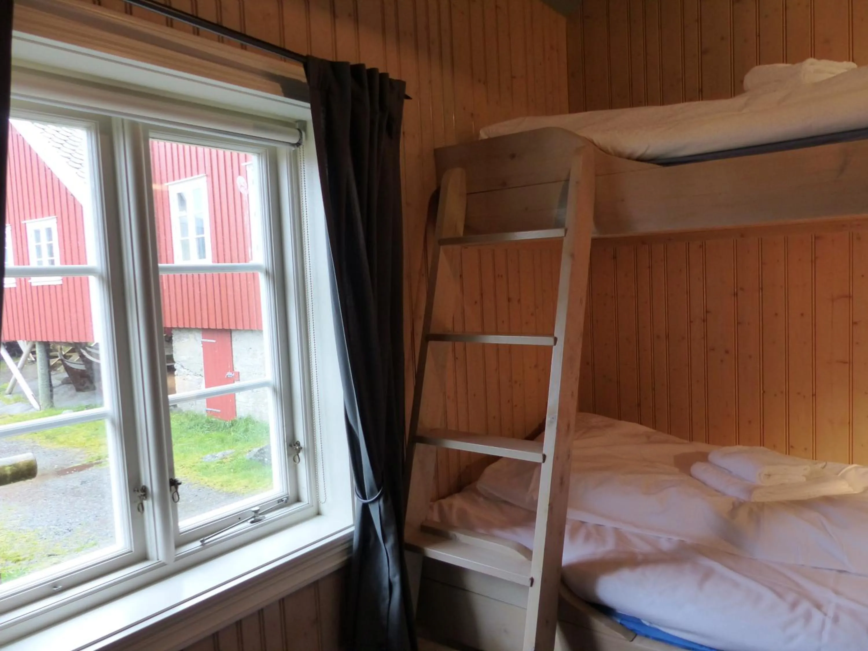 Bedroom, Bed in Reine Rorbuer - by Classic Norway Hotels