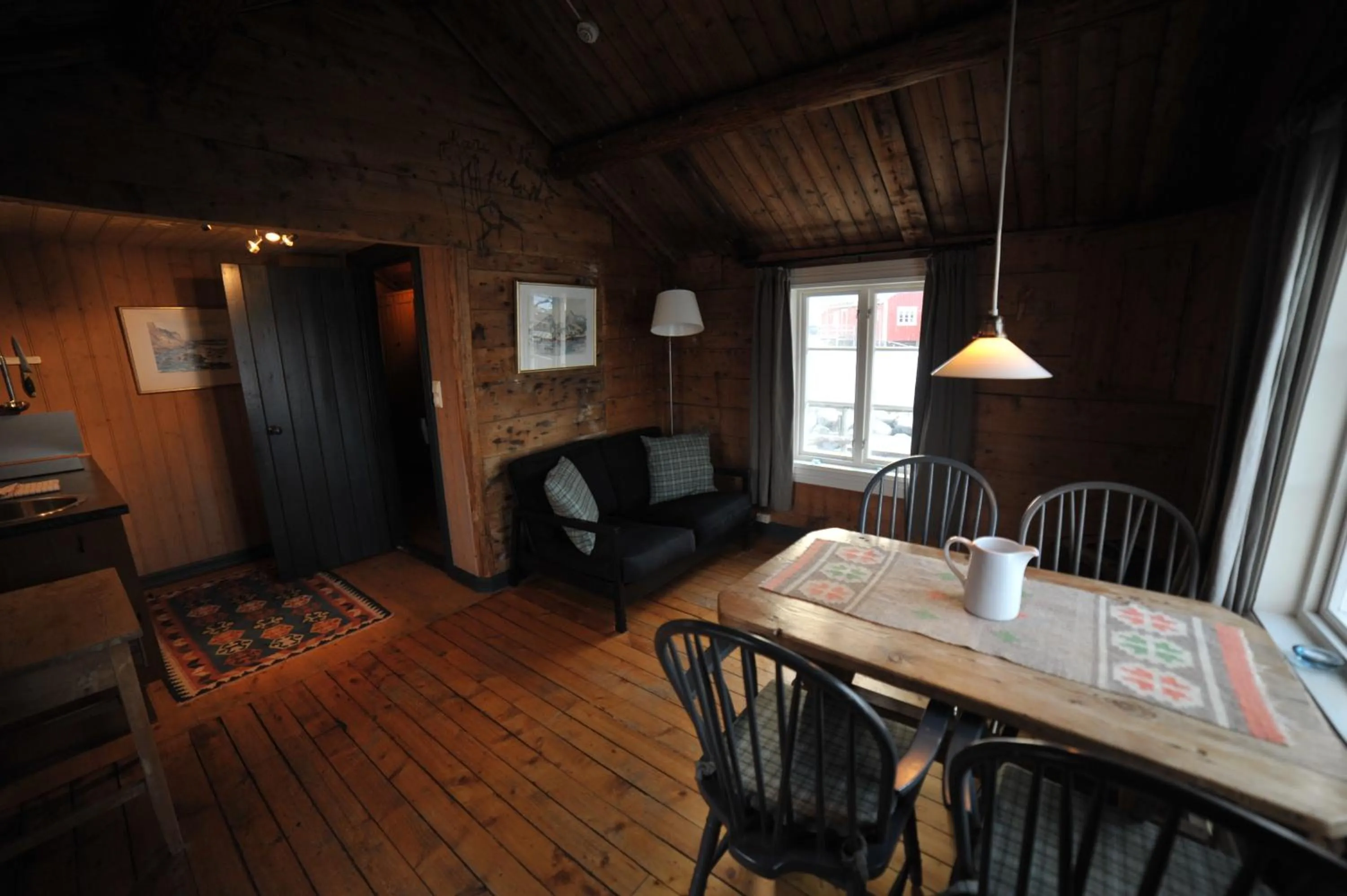 Living room in Reine Rorbuer - by Classic Norway Hotels