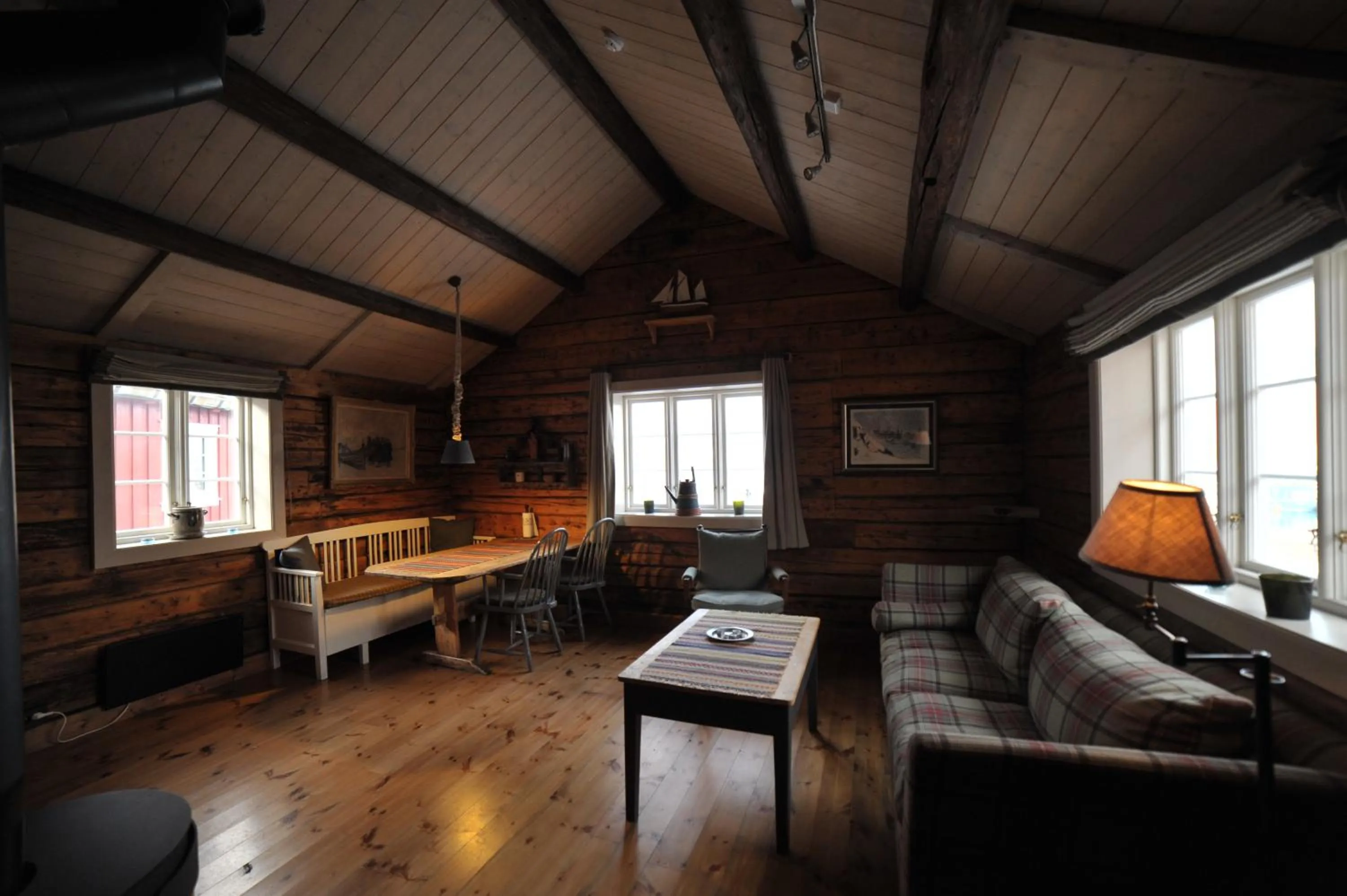 Living room in Reine Rorbuer - by Classic Norway Hotels