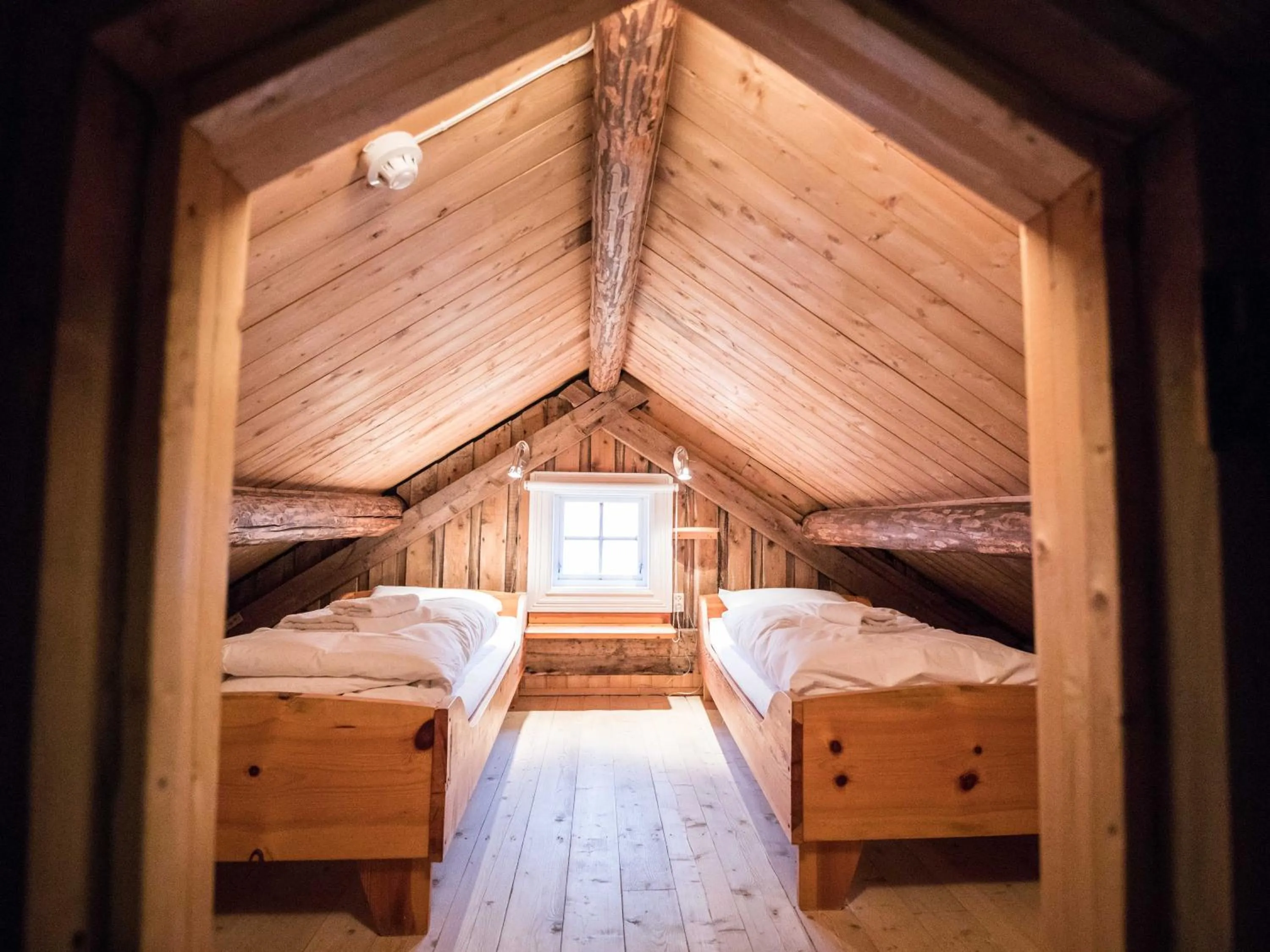Bedroom, Bed in Reine Rorbuer - by Classic Norway Hotels