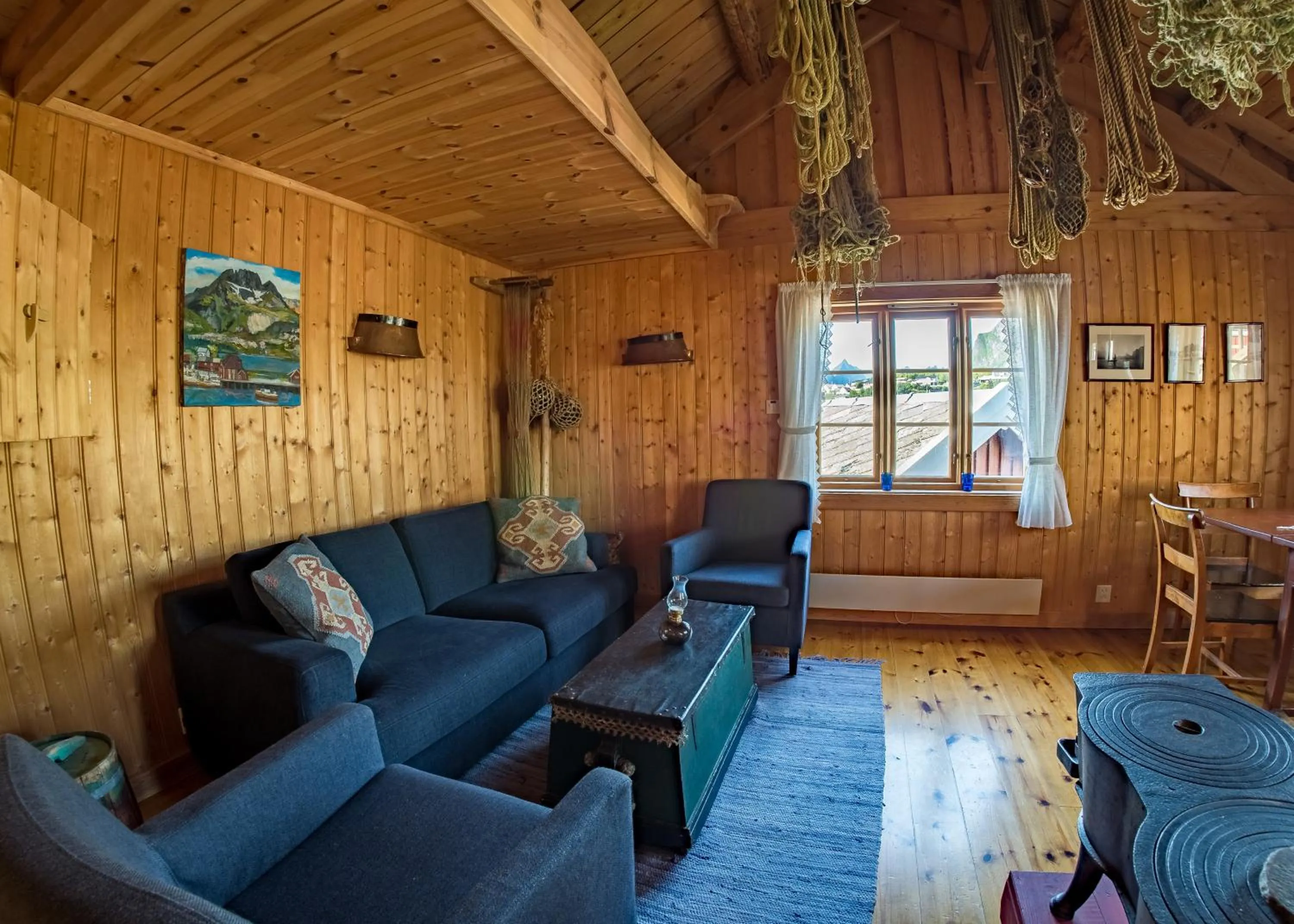 Living room in Reine Rorbuer - by Classic Norway Hotels