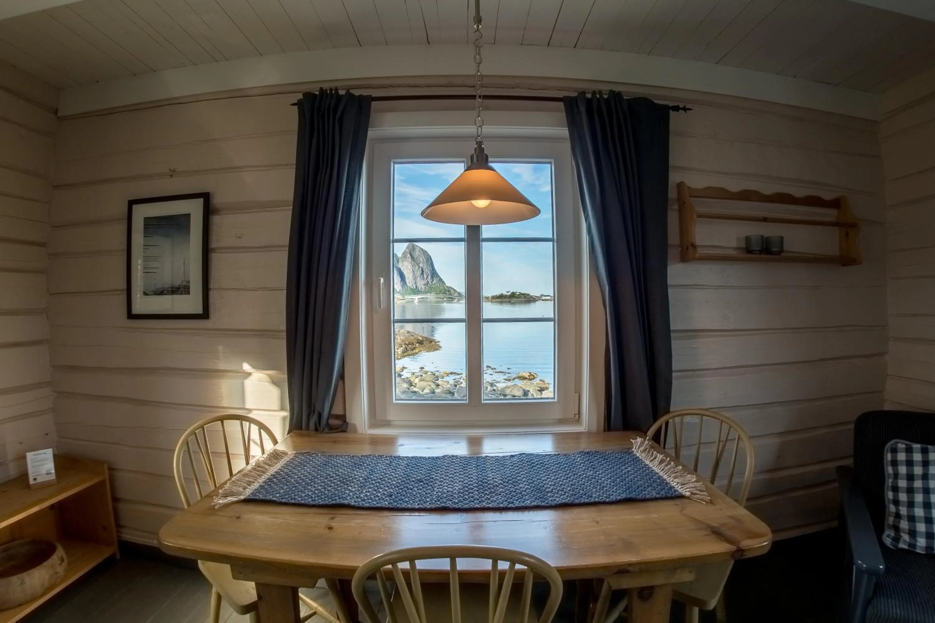 Dining area in Reine Rorbuer - by Classic Norway Hotels