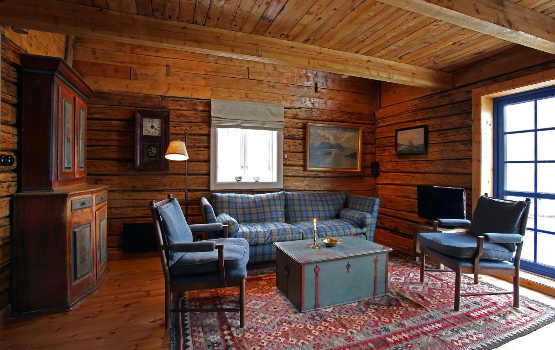 Living room in Reine Rorbuer - by Classic Norway Hotels