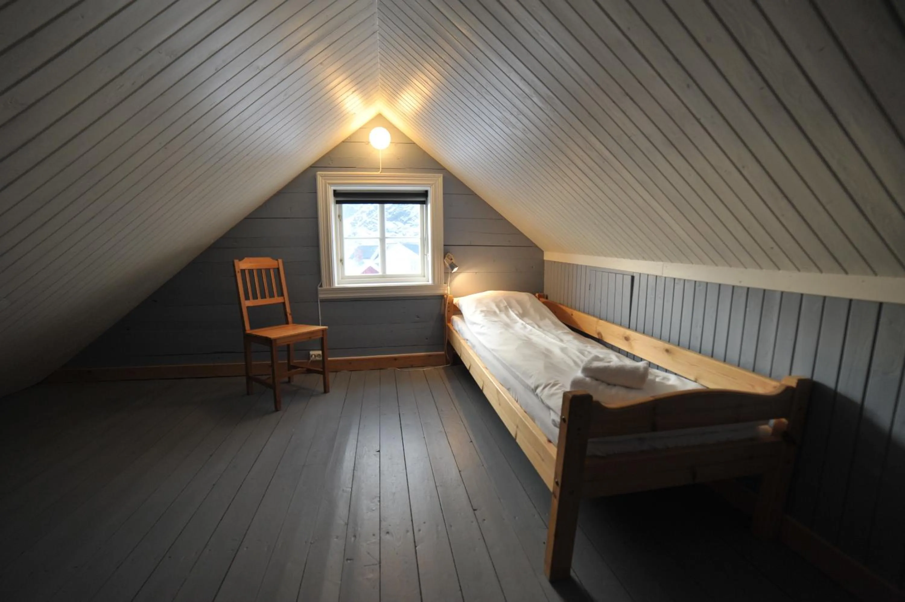 Bedroom, Bed in Reine Rorbuer - by Classic Norway Hotels